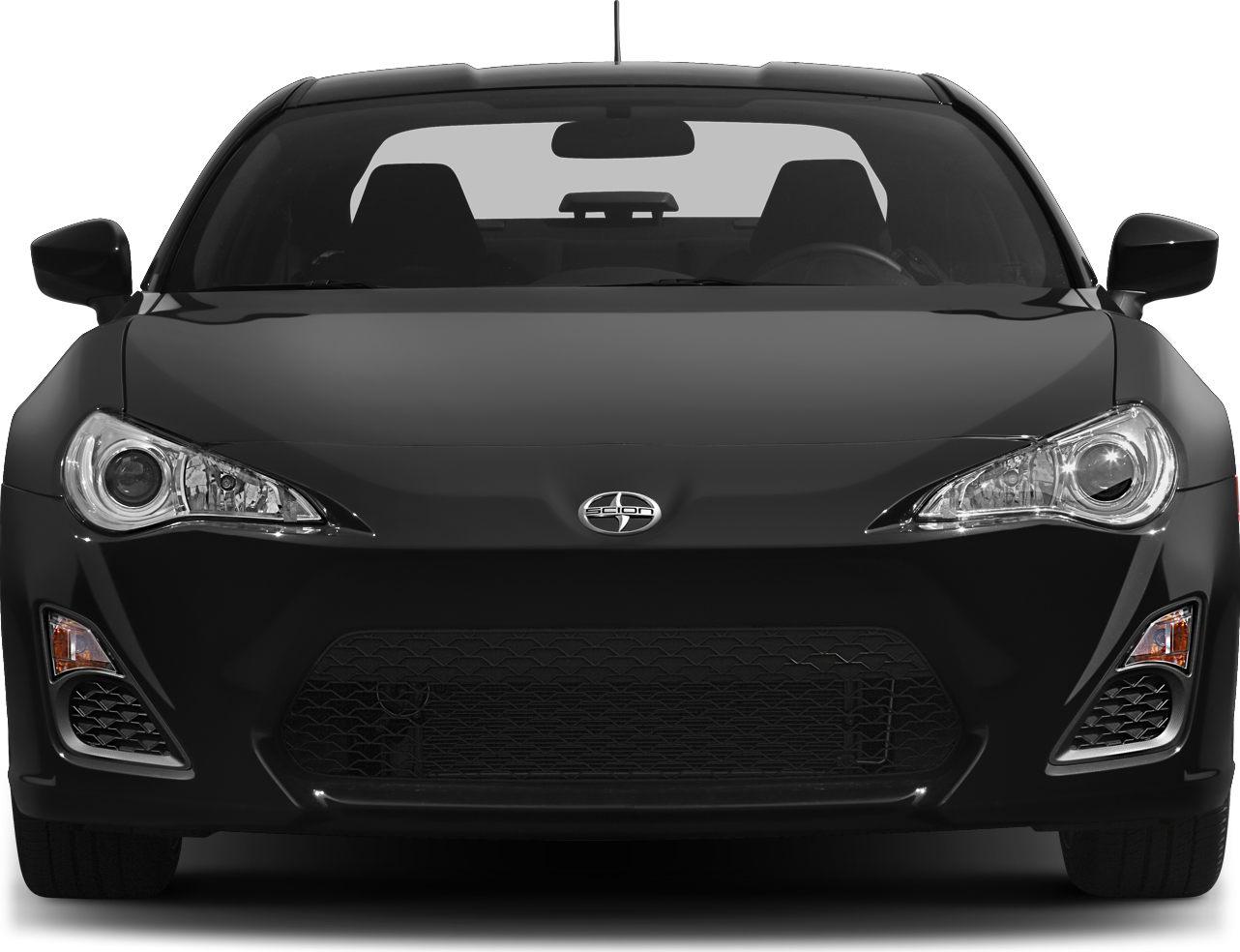 Sporty coupe with aggressive headlights and wide grille front view
