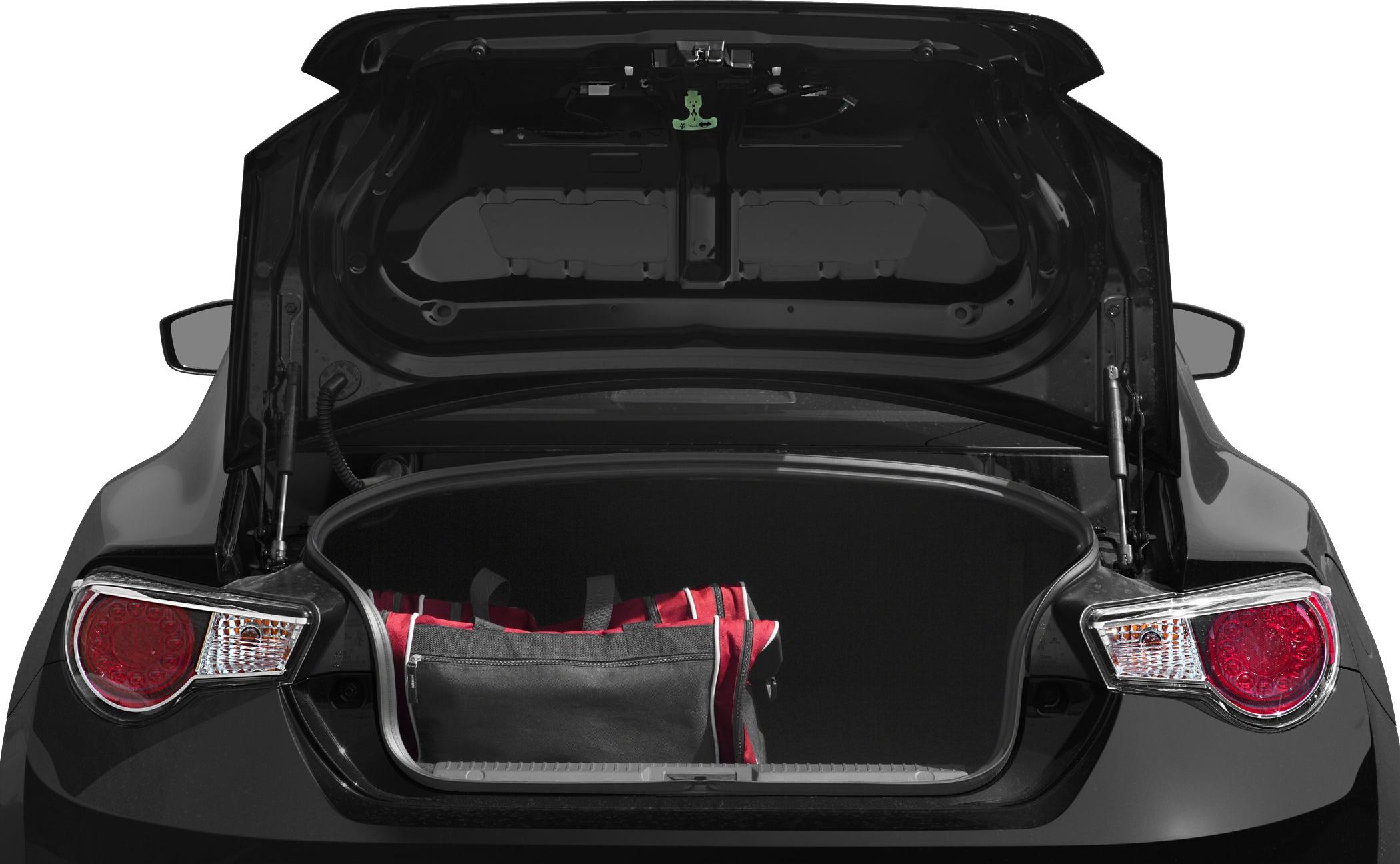 Open rear trunk with bags inside sports coupe
