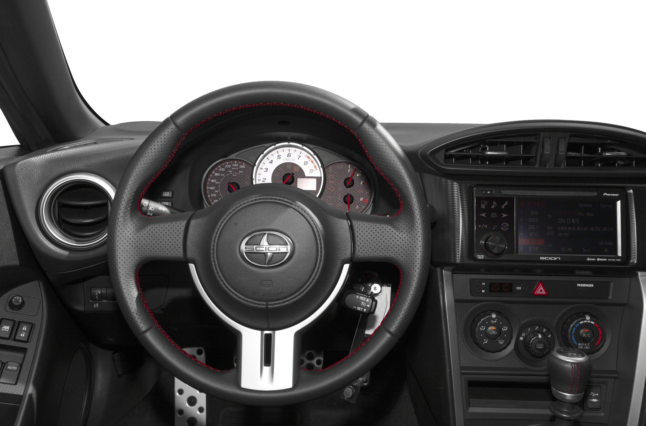 Steering wheel, instrument cluster, center console with infotainment and climate controls