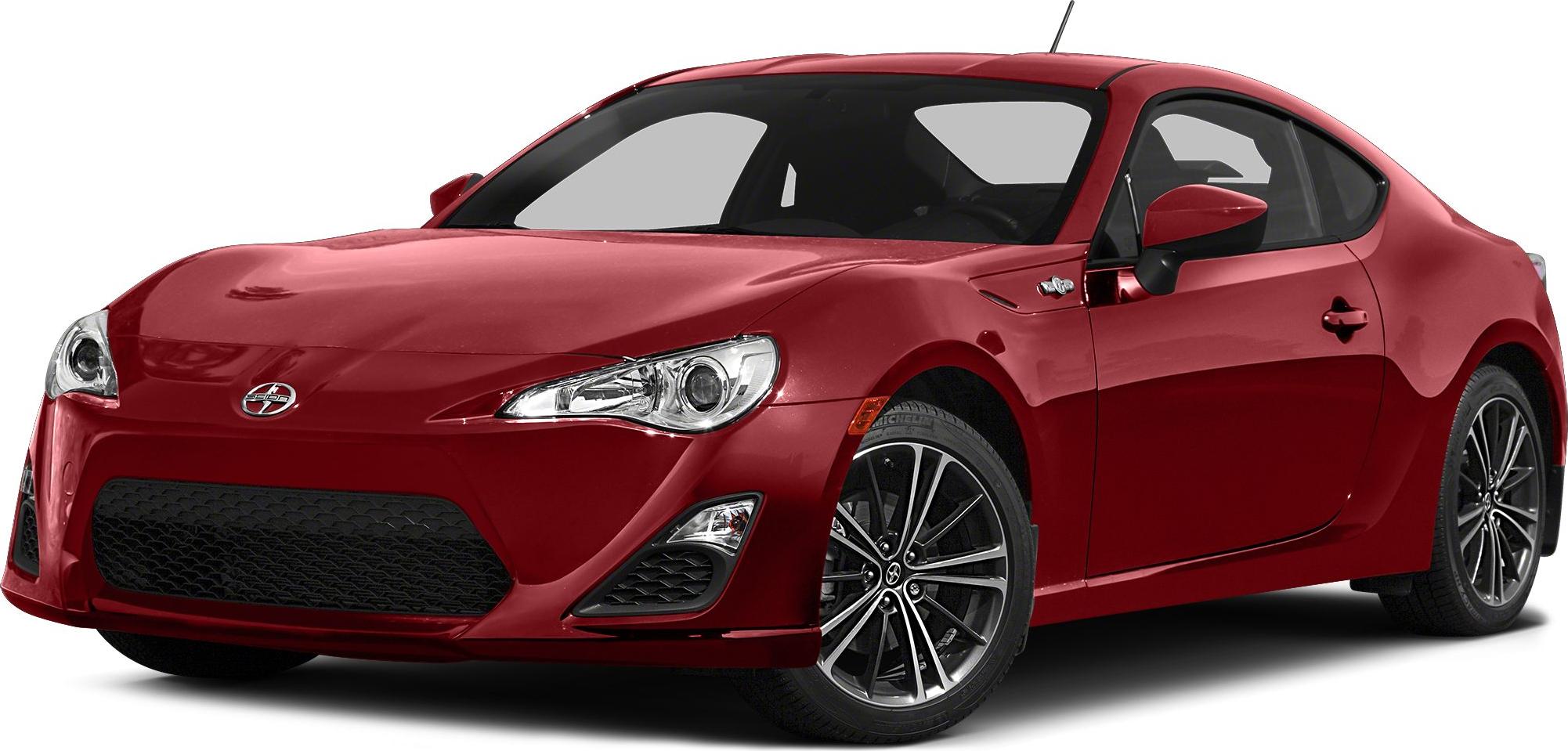 Sporty coupe front-side with alloy wheels and sleek headlights