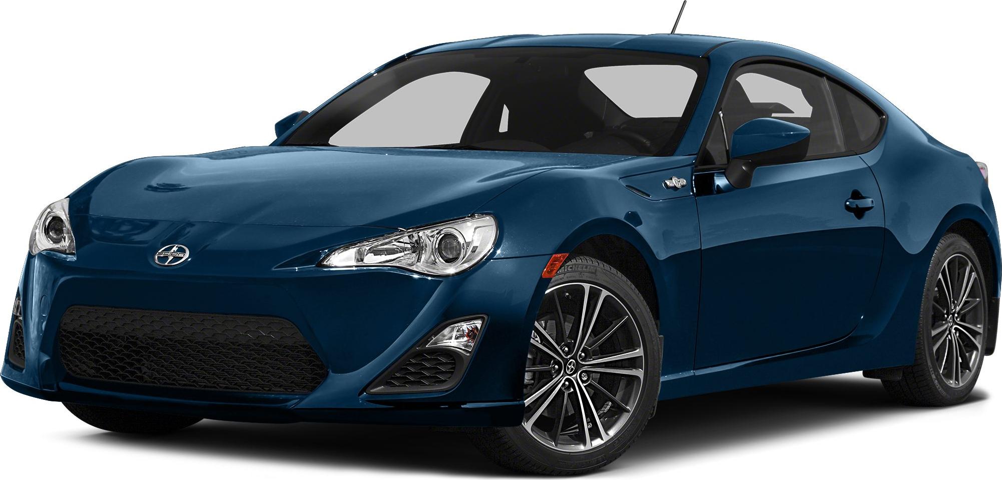 Front three-quarter view of blue sports coupe with alloy wheels and sleek headlights