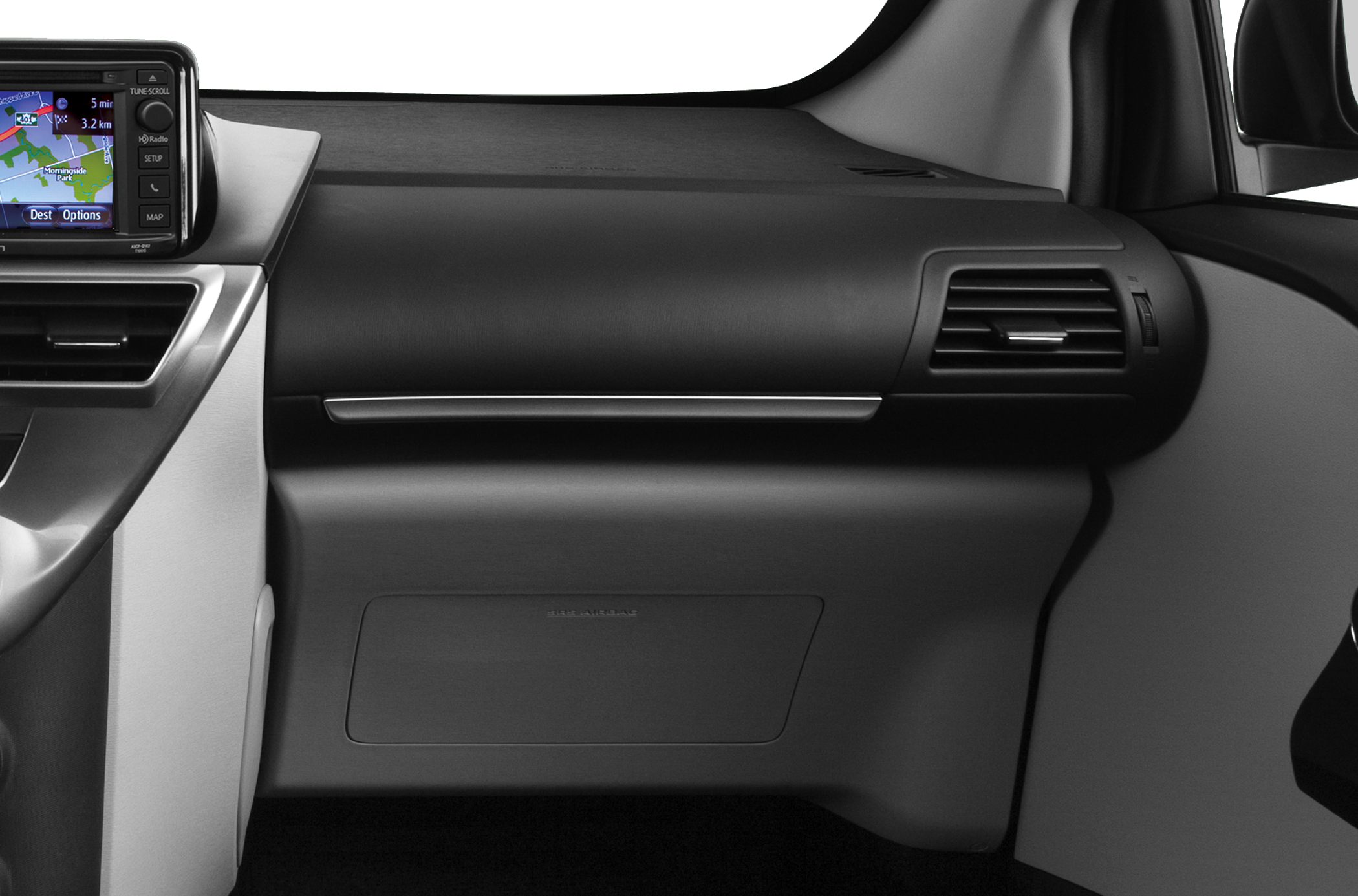 Dashboard interior with navigation screen and air vents