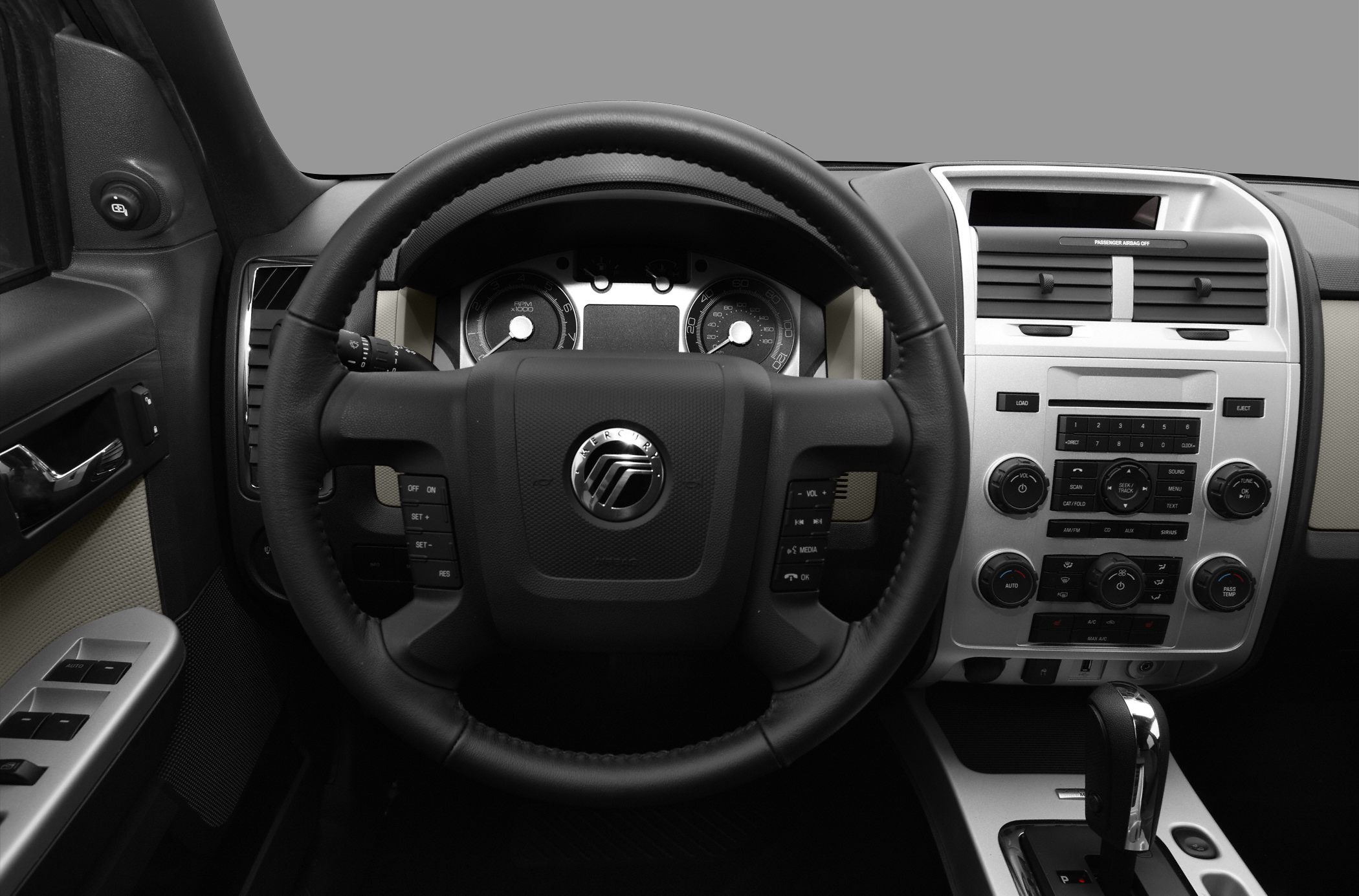 Steering wheel, instrument cluster, and center console interior view