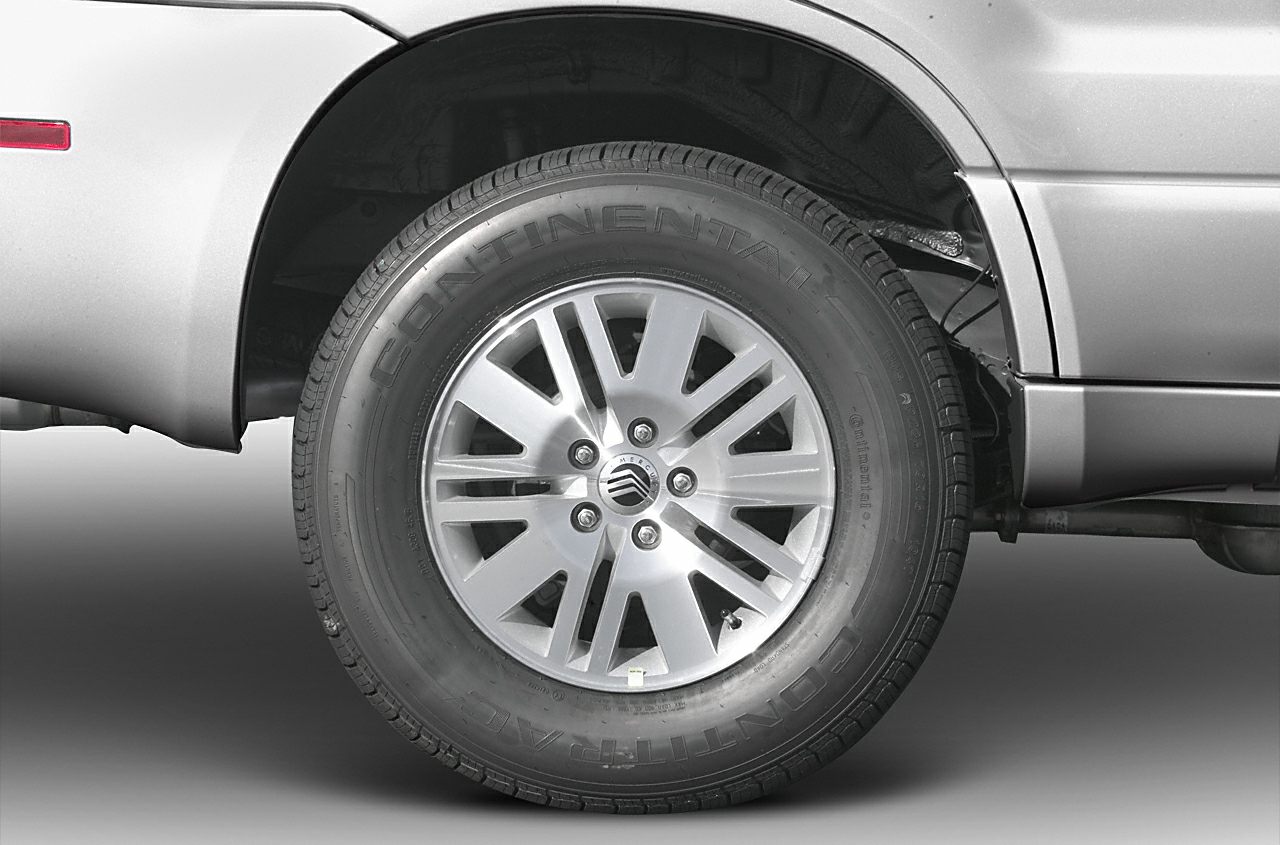 Alloy wheel with Continental tire on Mercury Mariner I rear