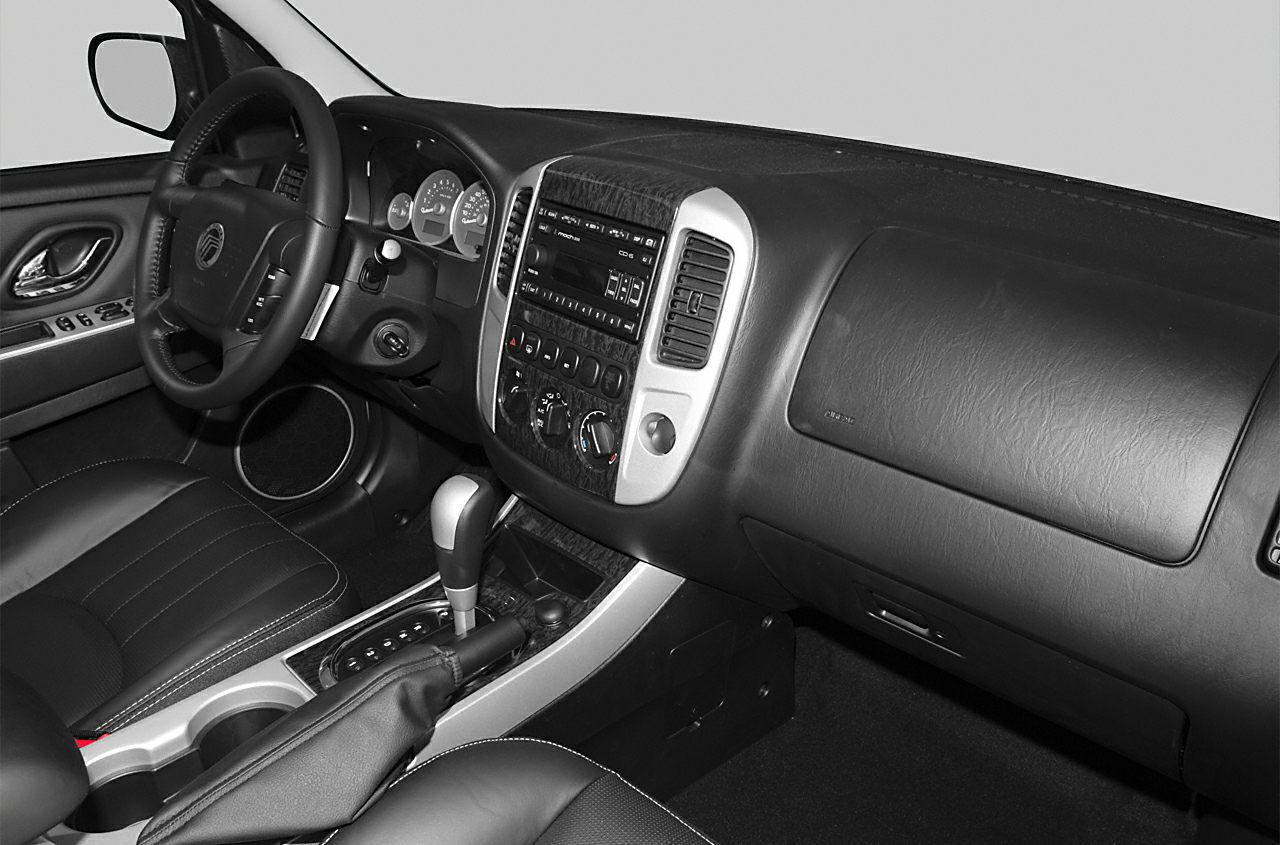 Car interior with dashboard, steering wheel, and center console