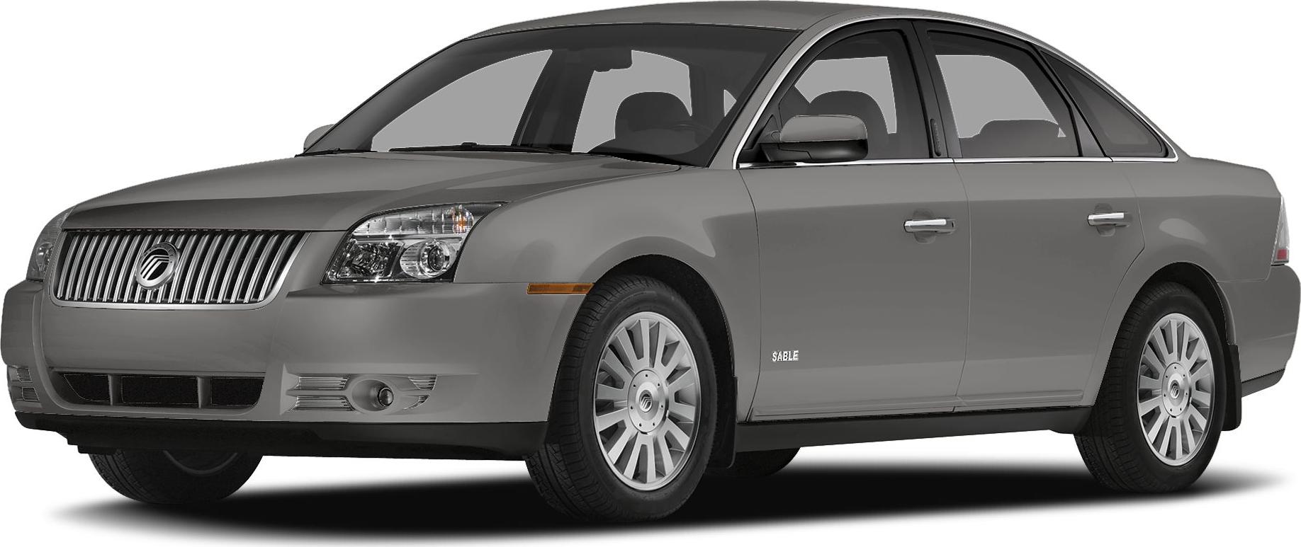 Front-side view of a midsize sedan with vertical chrome grille and alloy wheels