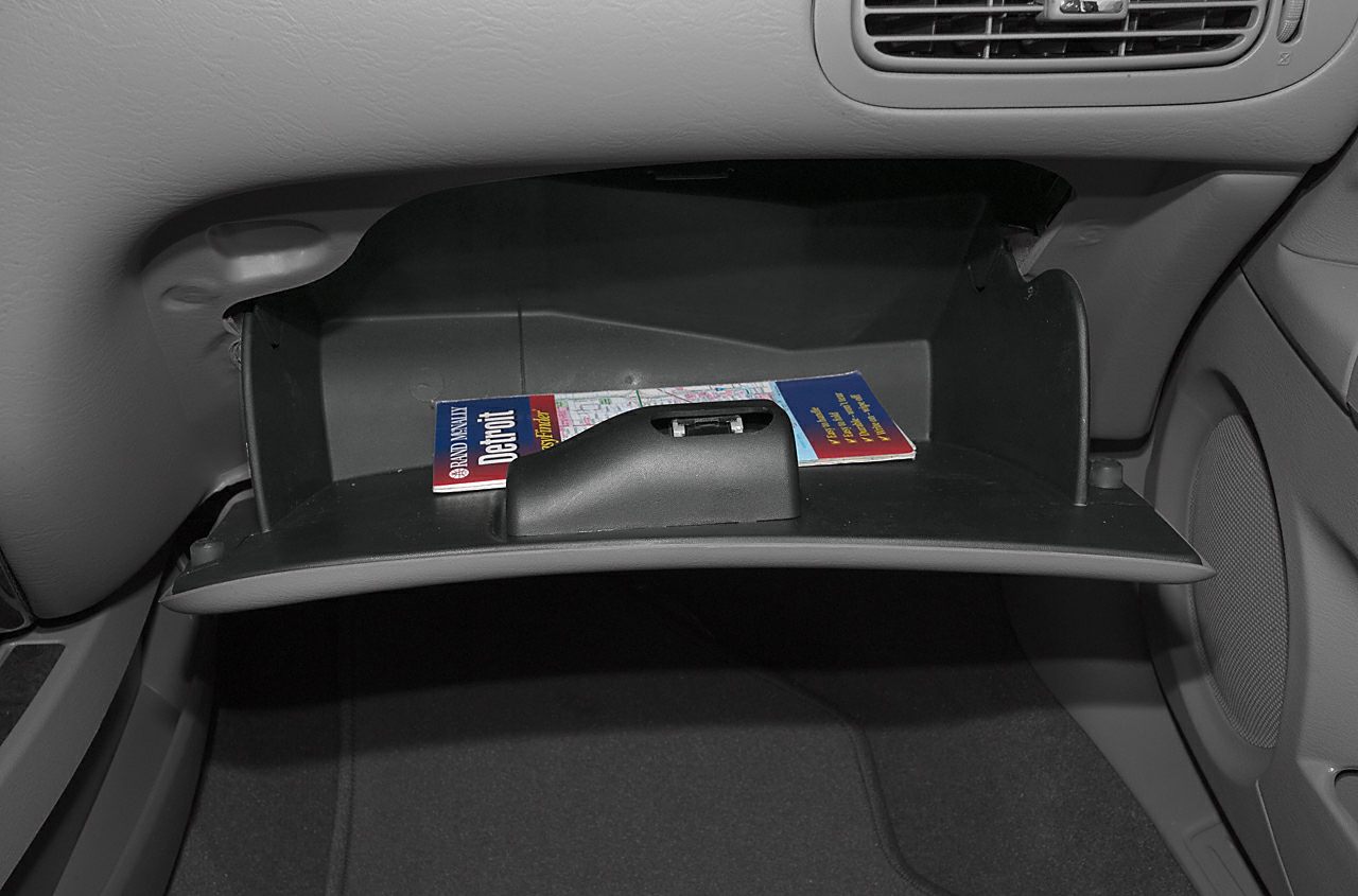 Glove compartment with storage and integrated dashboard vent