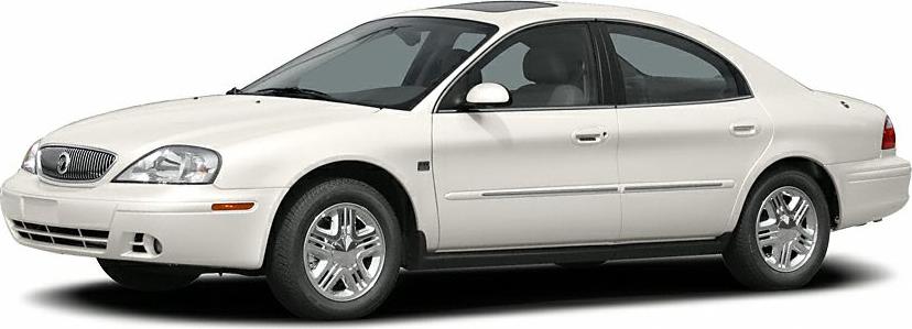 Side view of a white 4-door sedan with smooth body lines and chrome wheels