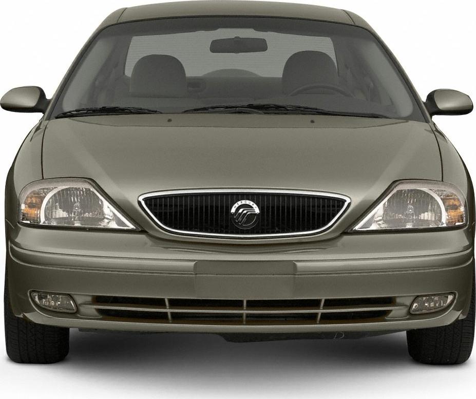 Front view with distinctive headlights and chrome-accented grille