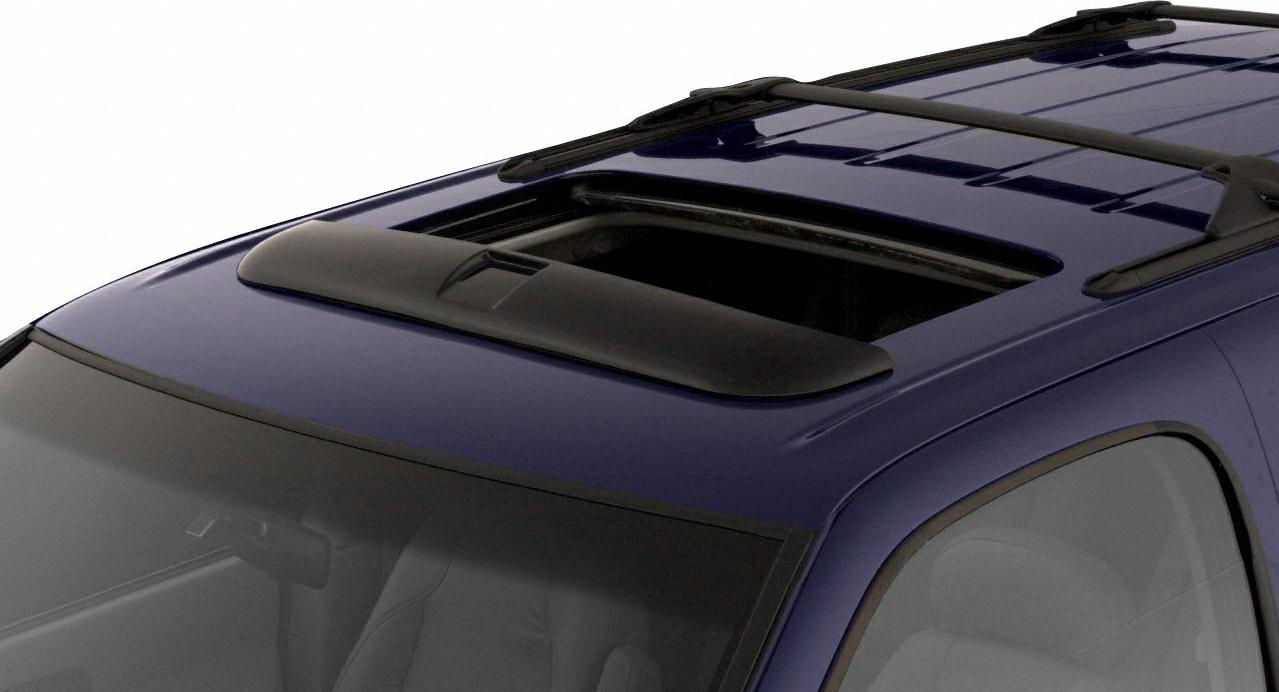 Open sunroof and black roof rails on vehicle roof