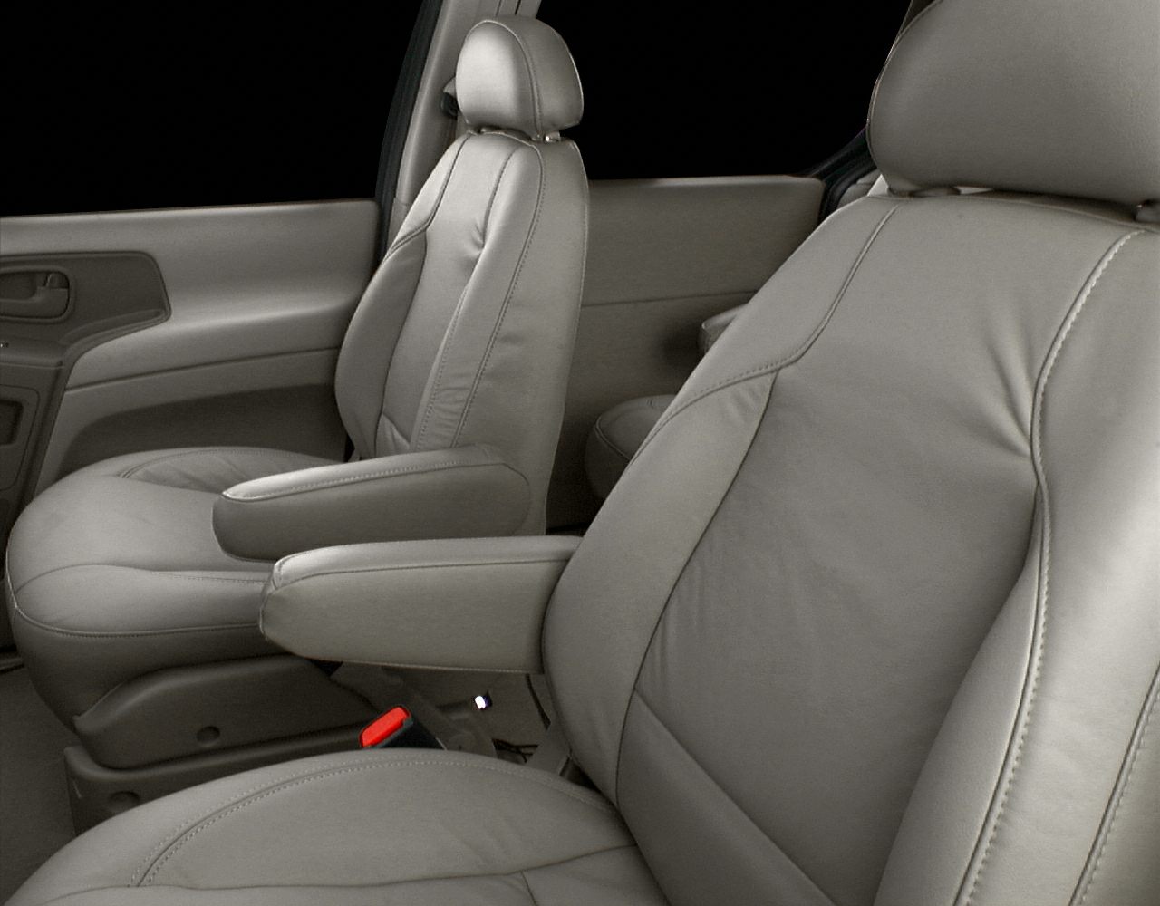 Leather front seats with armrests and detailed stitching