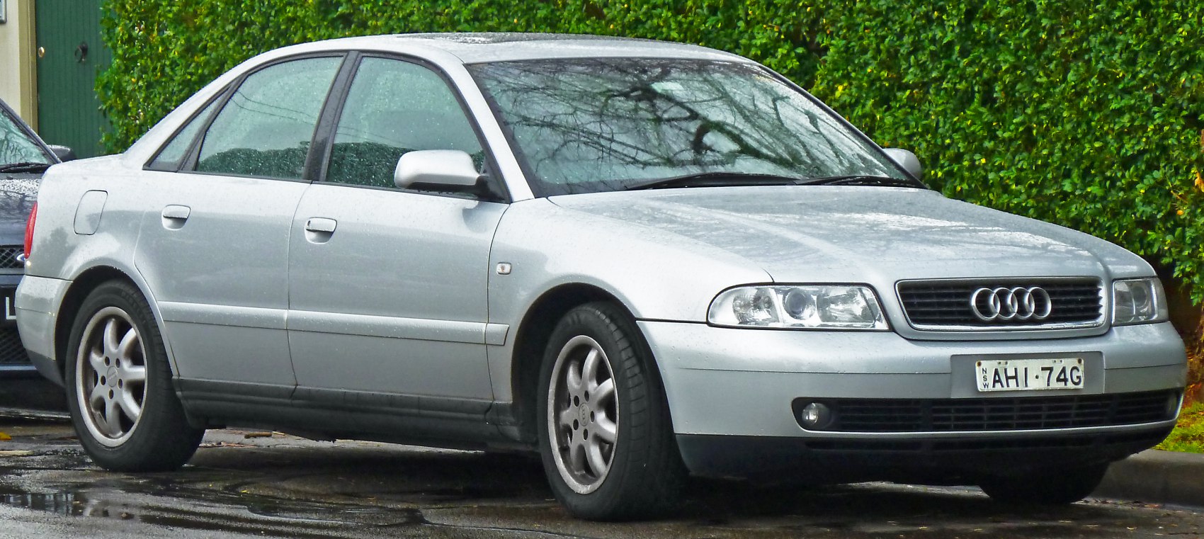 Silver 4-door sedan with alloy wheels and classic Audi front design