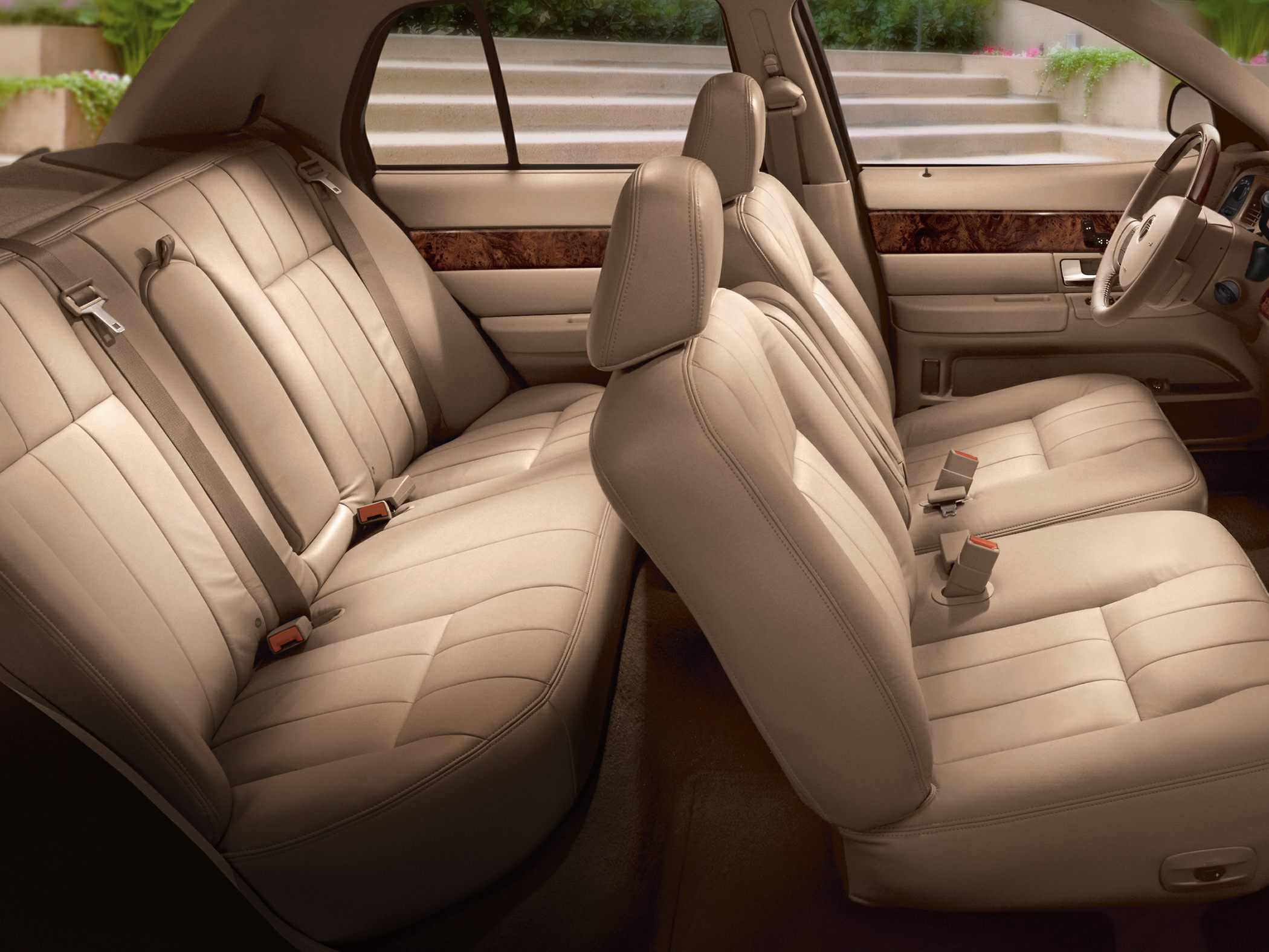 Leather seats and wood trim interior of a classic full-size sedan