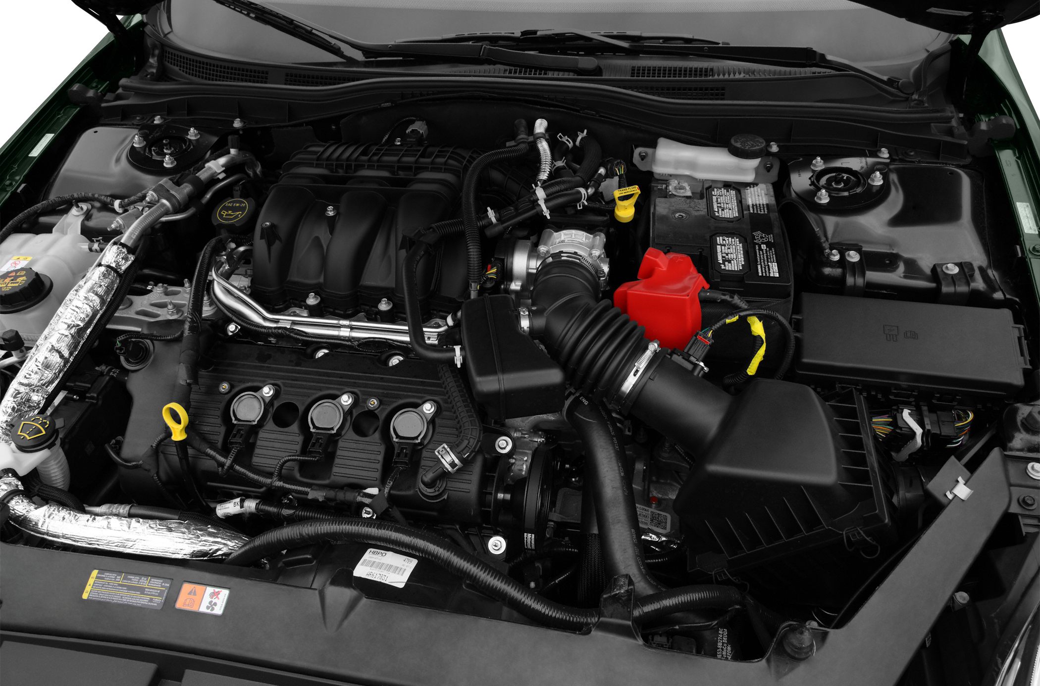 Engine bay with detailed intake, battery, and wiring components