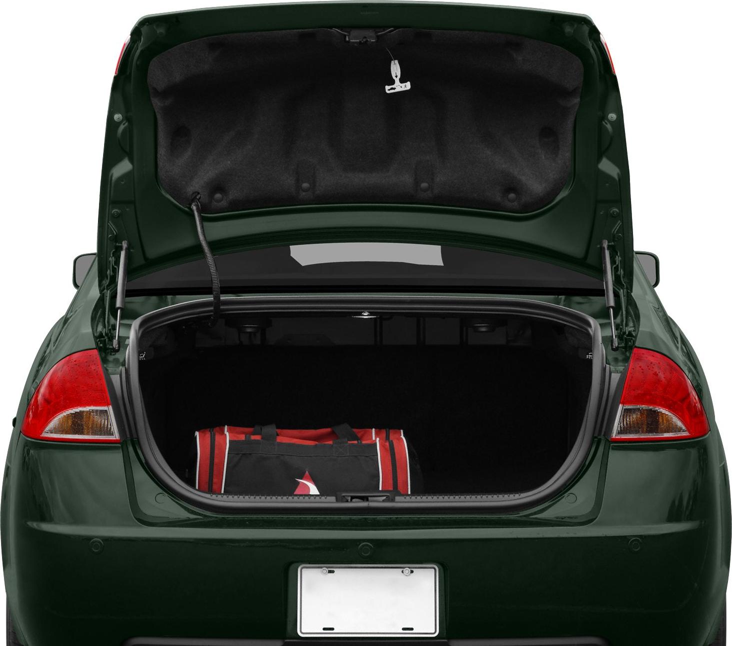 Rear trunk open showing spacious interior with a travel bag inside