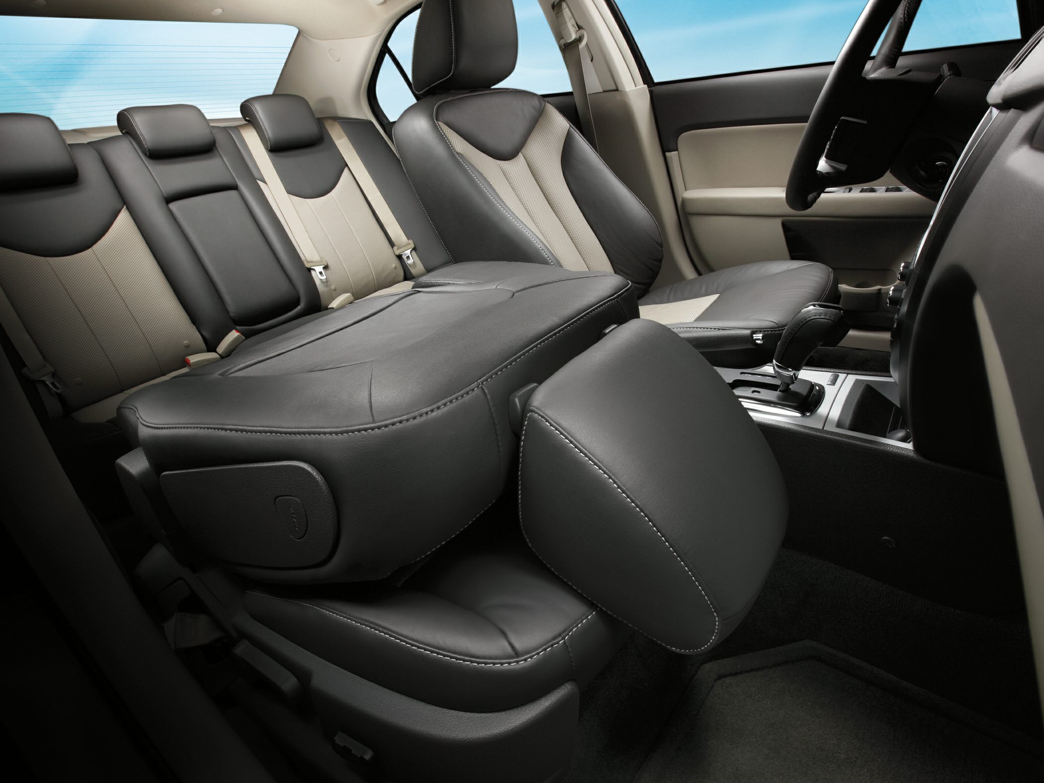 Folded front passenger seat and rear seats in leather upholstery