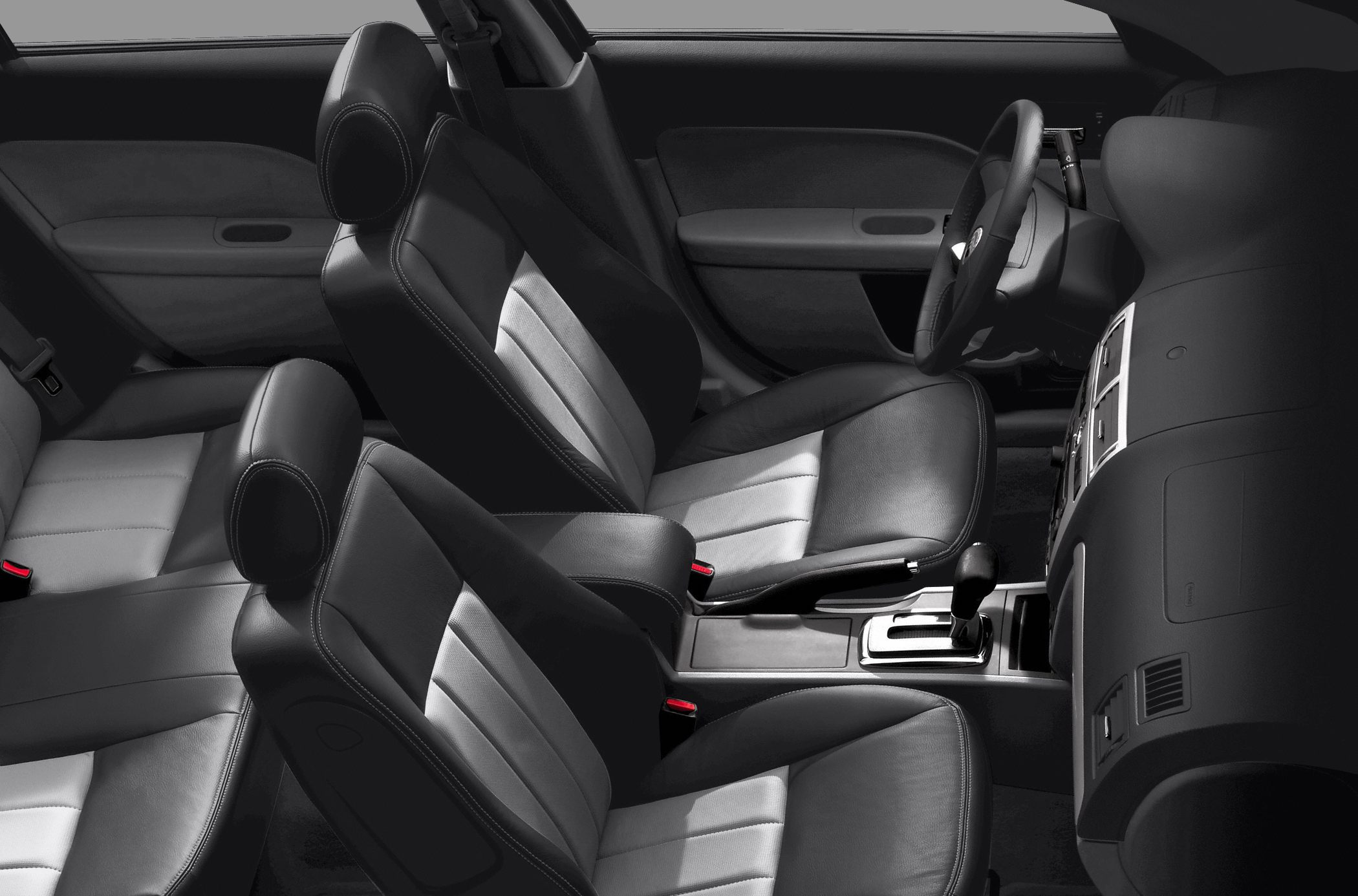 Two-tone leather front and rear seats with dashboard and gear shift