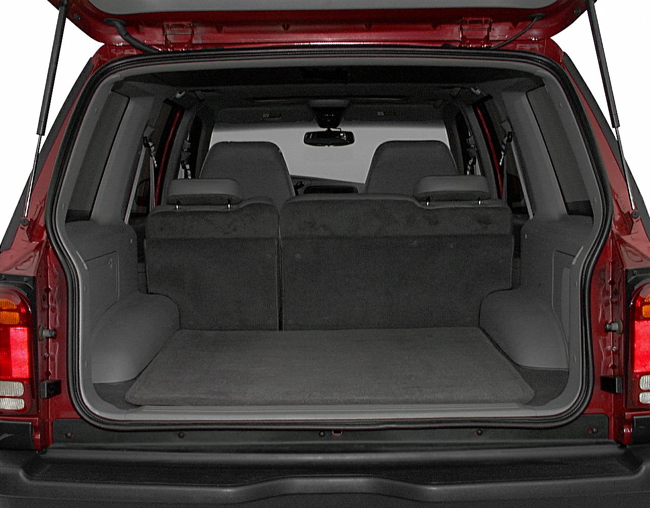 Open rear cargo area and back seats with tailgate open