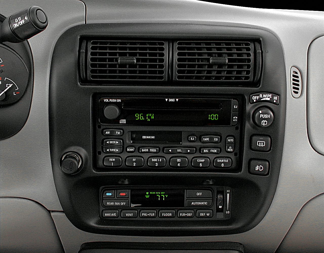 Central dashboard with air vents and stereo control panel