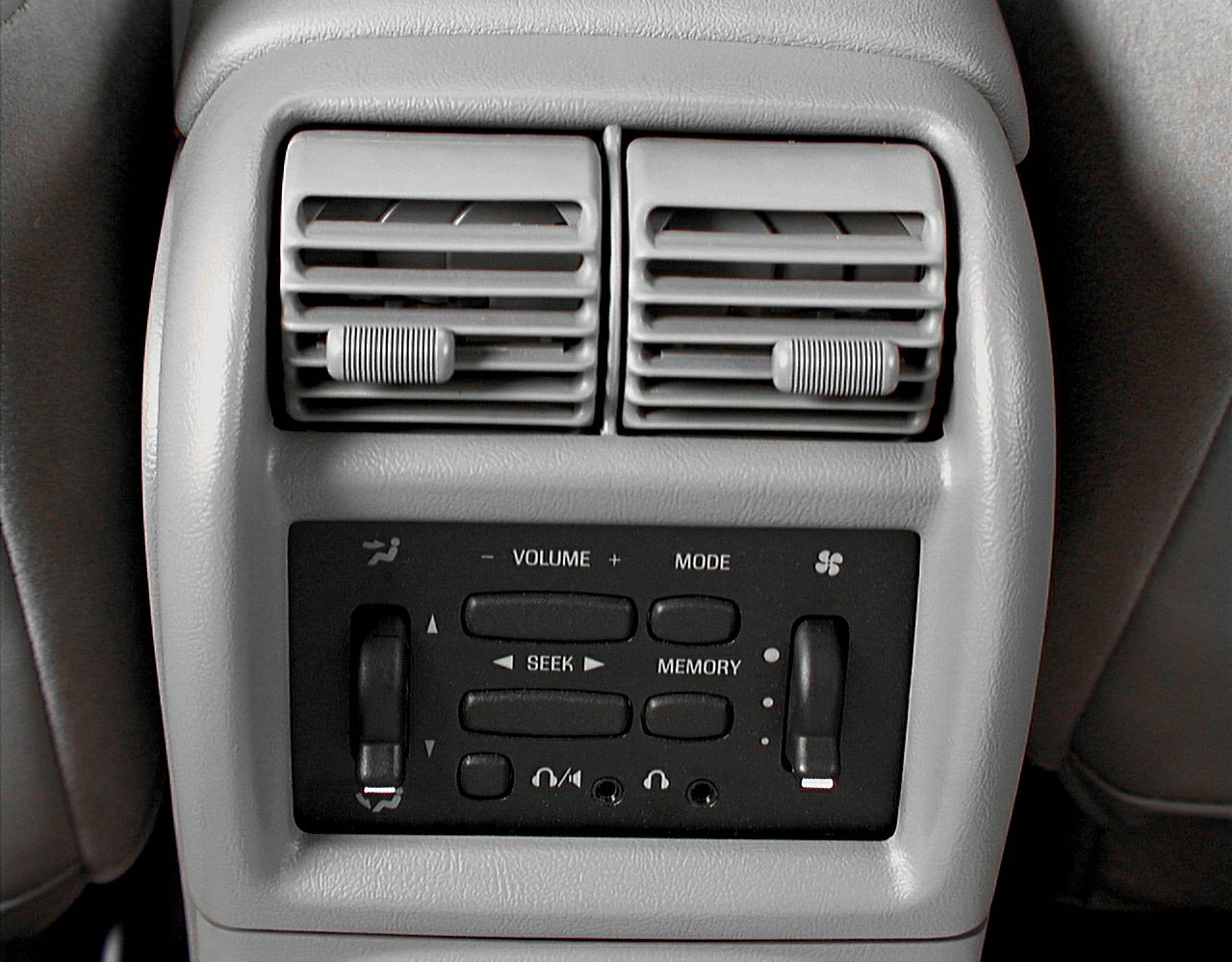 Rear climate air vents with integrated audio control panel