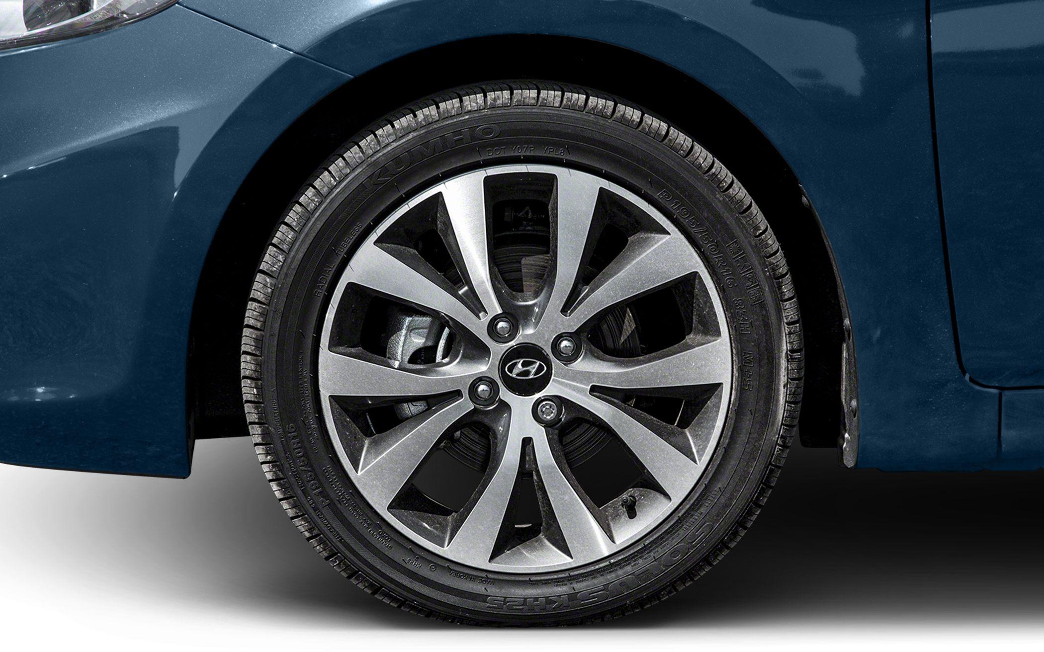 Close-up of alloy wheel and tire with intricate design