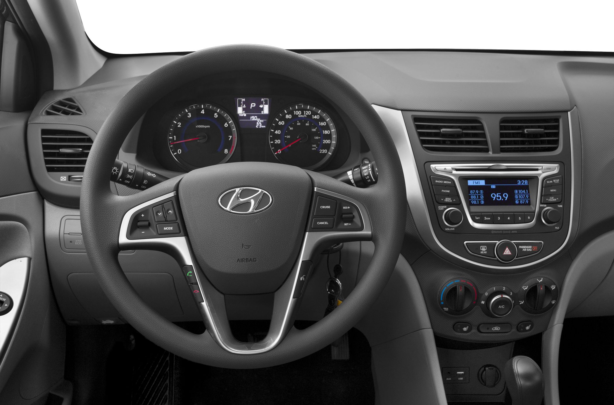 Interior dashboard and steering wheel with controls and instrument cluster