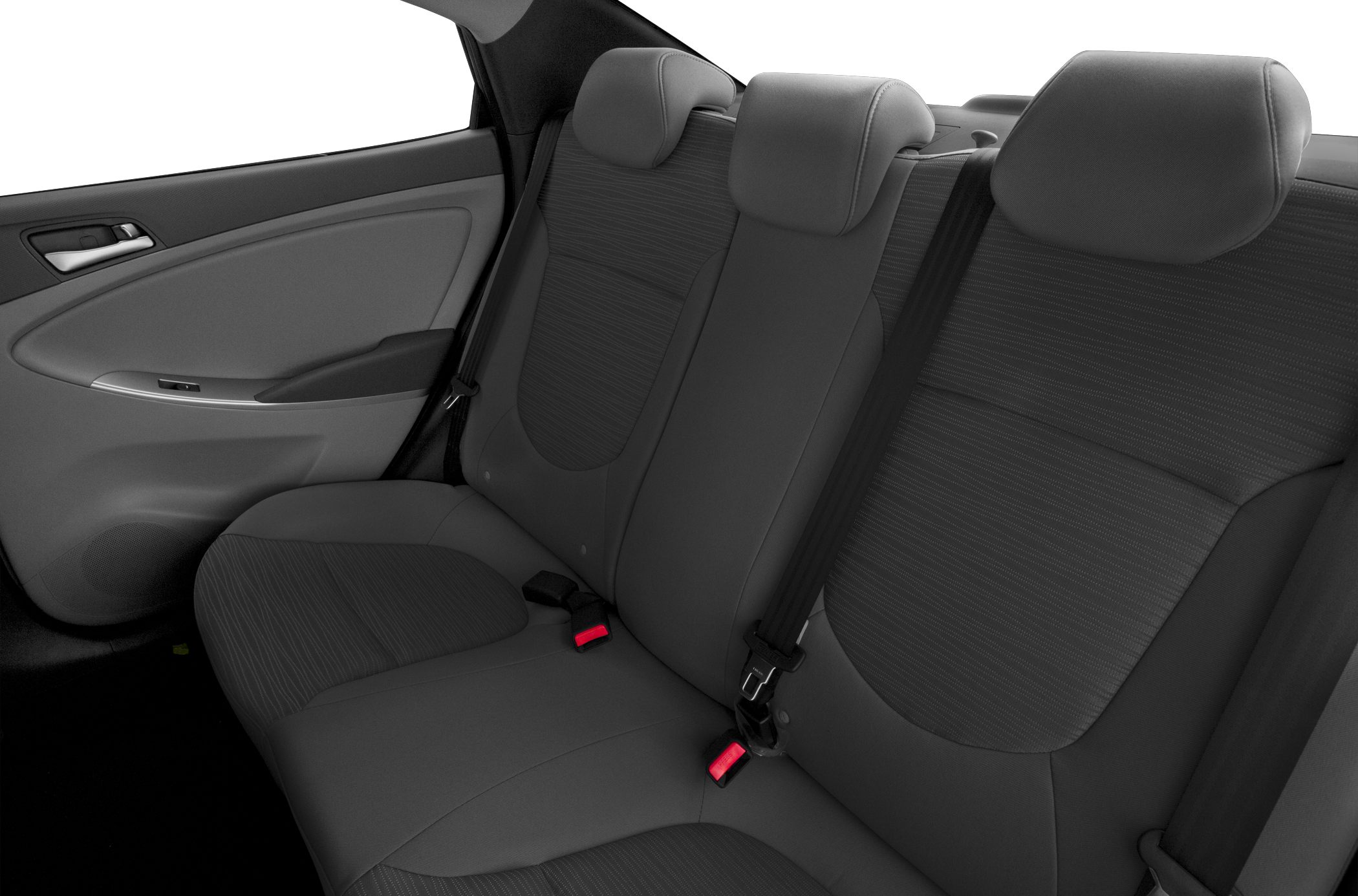 Rear seat upholstery with headrests and seatbelt setup.