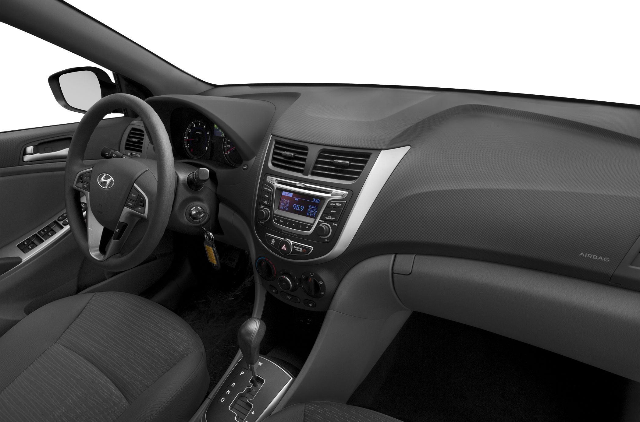 Interior dashboard, steering wheel and automatic transmission gearshift.