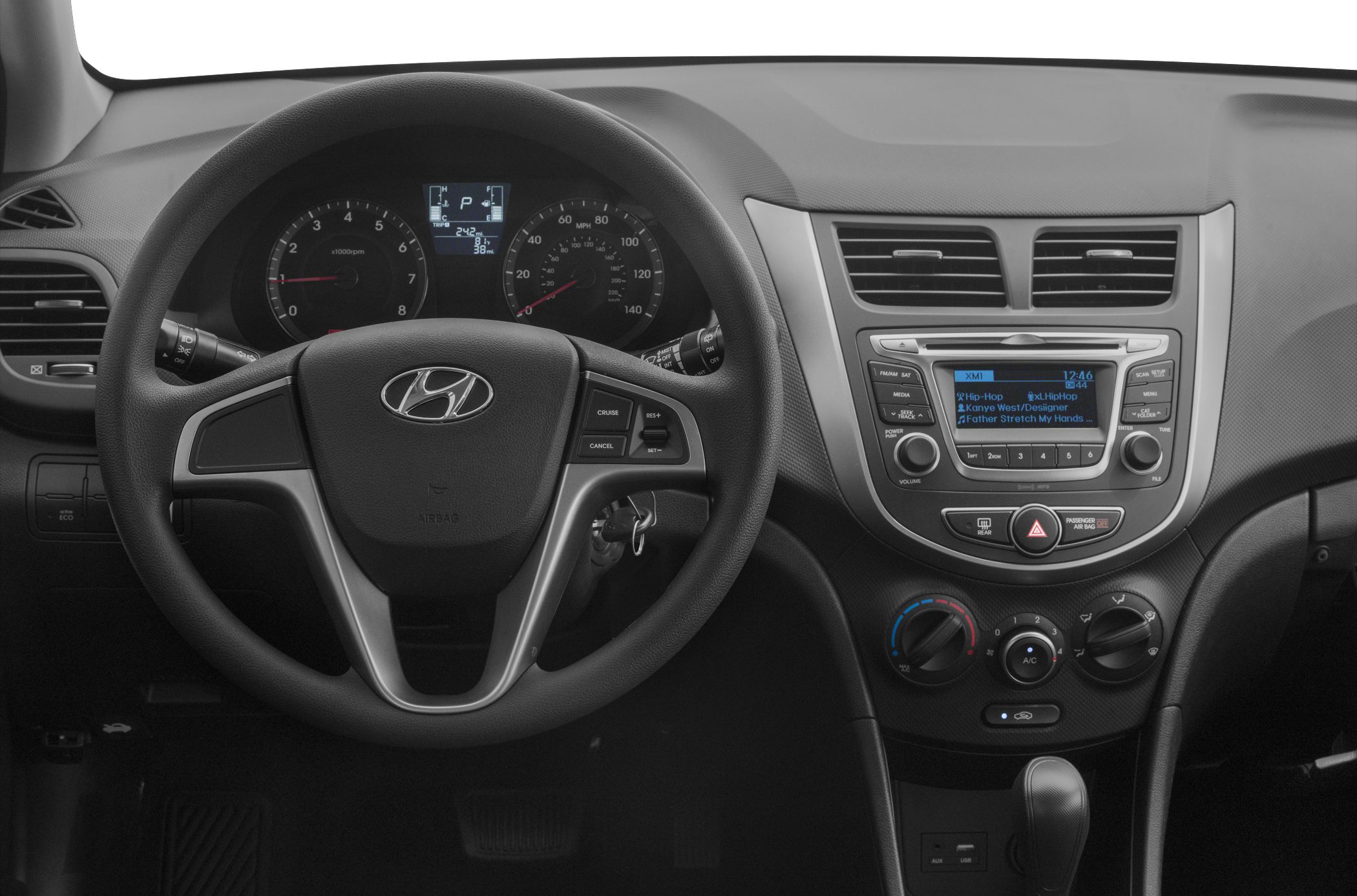 Steering wheel with controls and modern dashboard with entertainment system