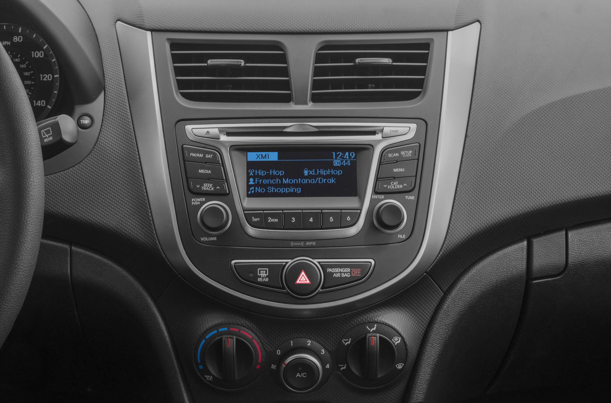 Dashboard and media console with climate control knobs