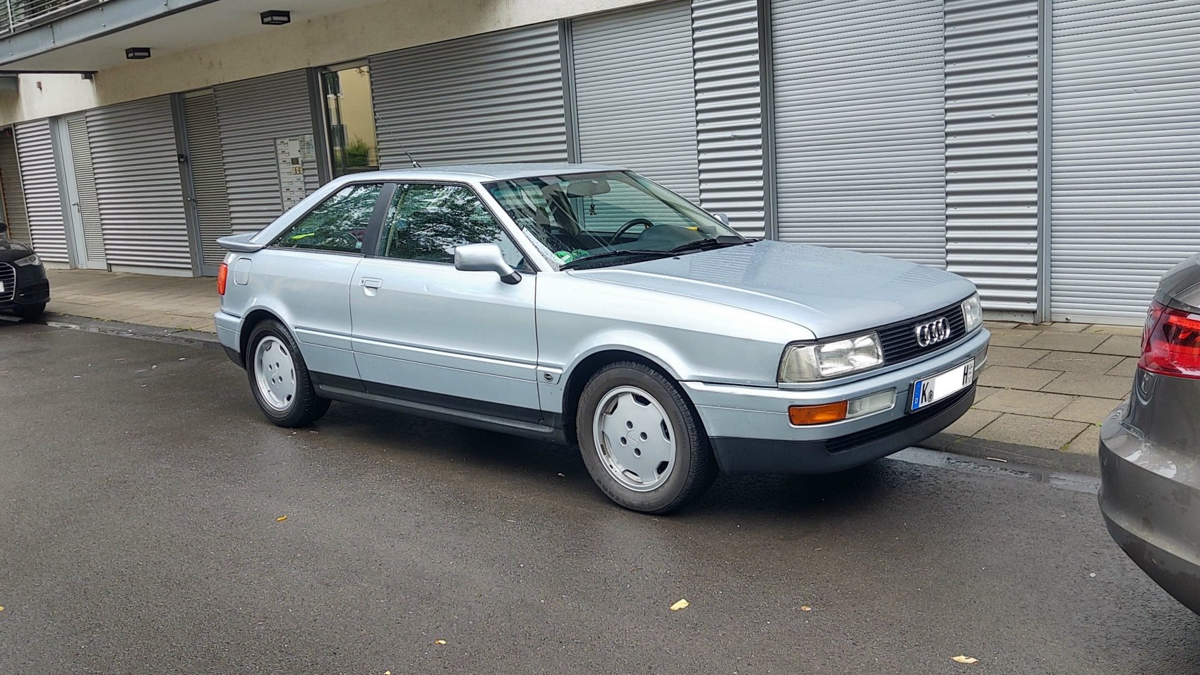 Silver hatchback with classic 1980s Audi styling and retro wheels