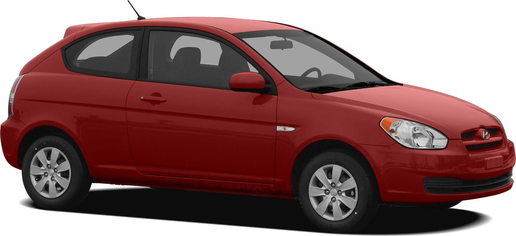 Compact red 3-door hatchback with smooth contours and alloy wheels.
