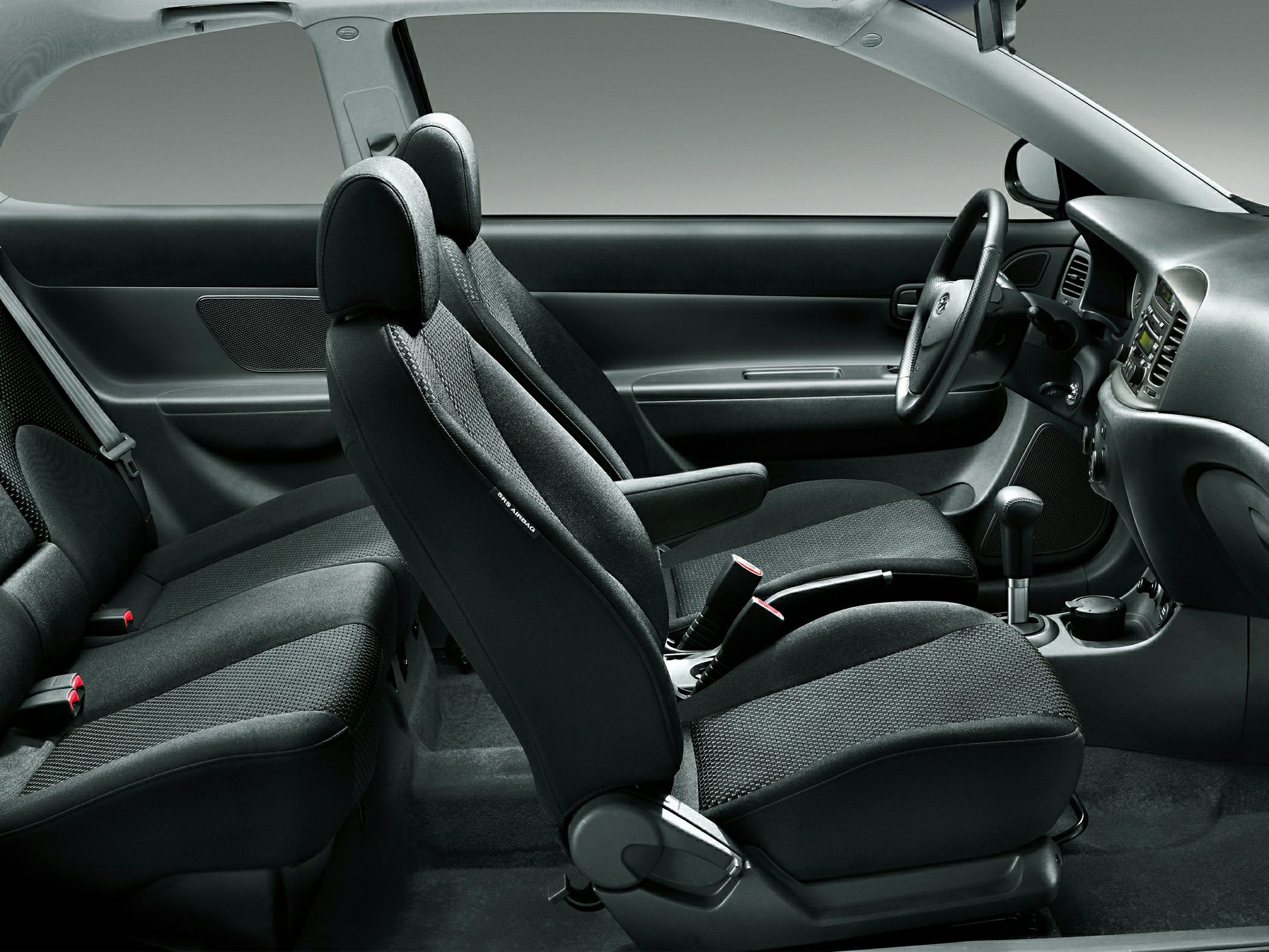 Compact hatchback front and rear fabric seats with dashboard and armrest