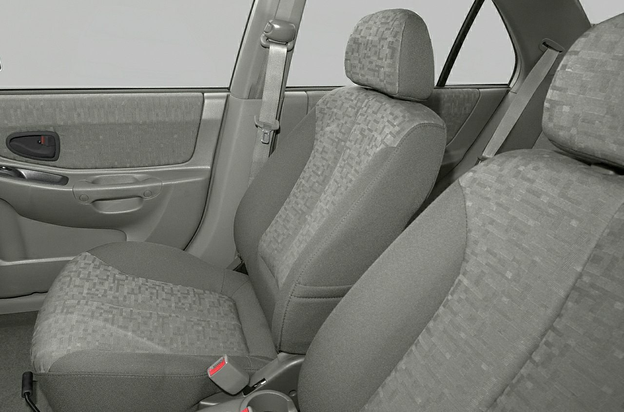 Front cloth seats and door panel with seat belts