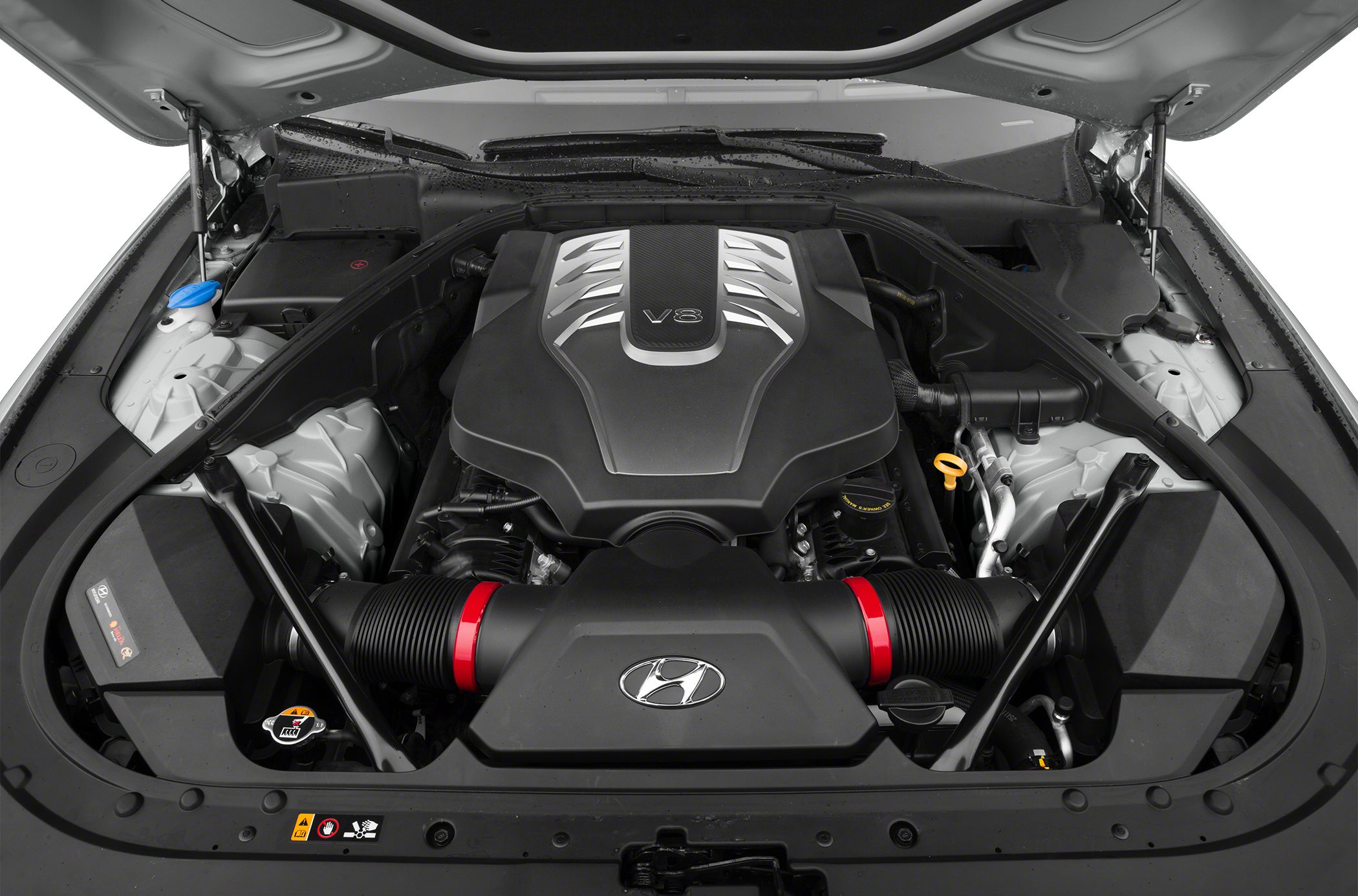 V8 engine layout under hood with visible intake ducts and structural supports