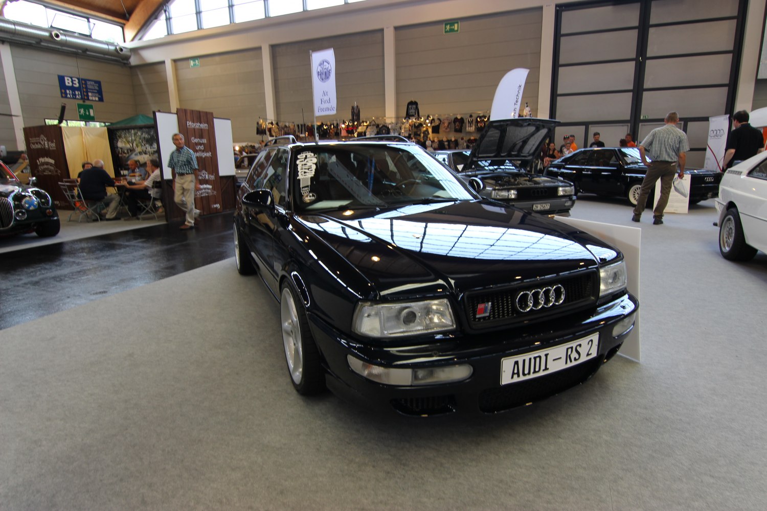 Black classic sporty station wagon with distinctive front grille and headlights
