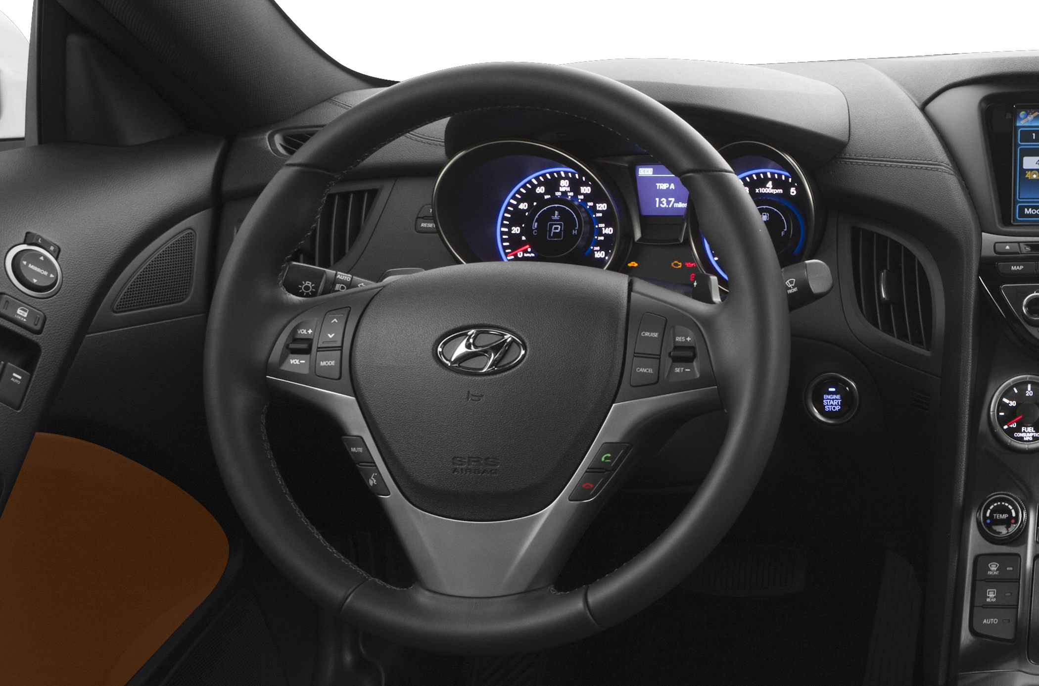 Steering wheel and illuminated instrument cluster with digital display.