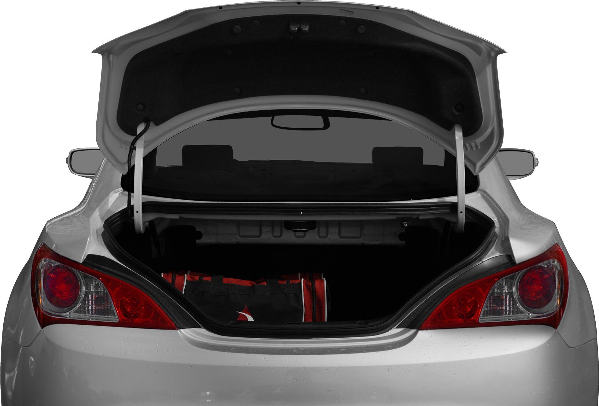 Open trunk and tail lights of a sports coupe rear
