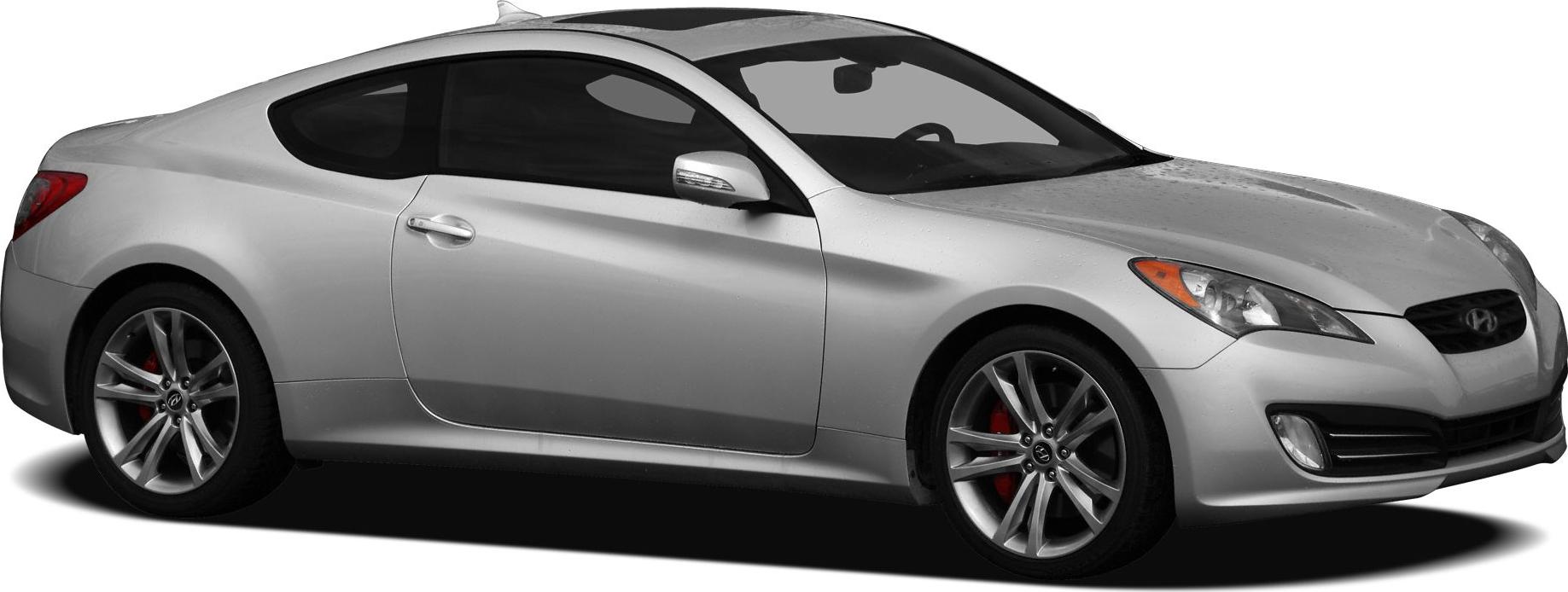 Silver two-door coupe with aerodynamic body and sporty alloy wheels