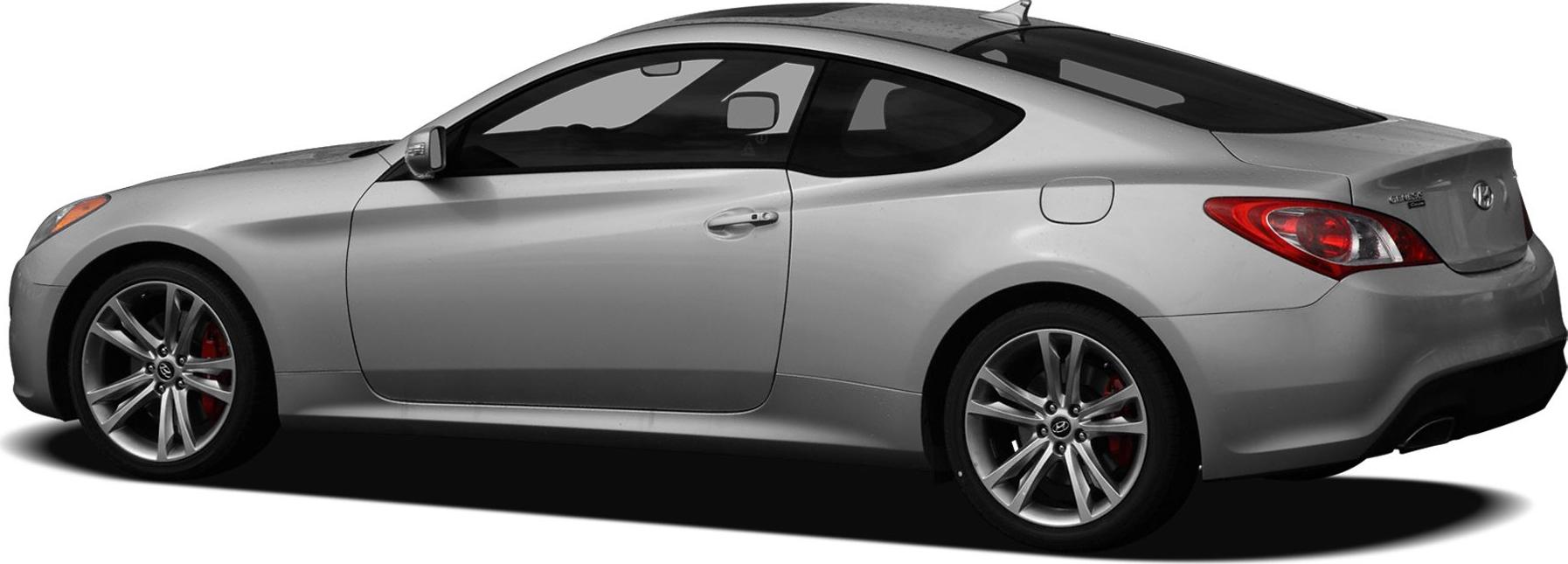 Silver two-door coupe, side profile with alloy wheels and red brake calipers