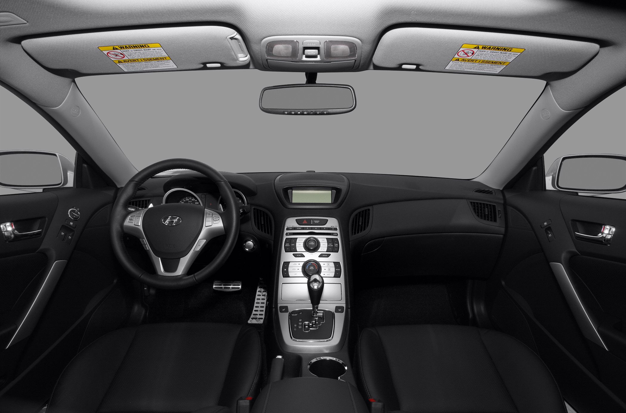 Dashboard, steering wheel, and center console of a car interior