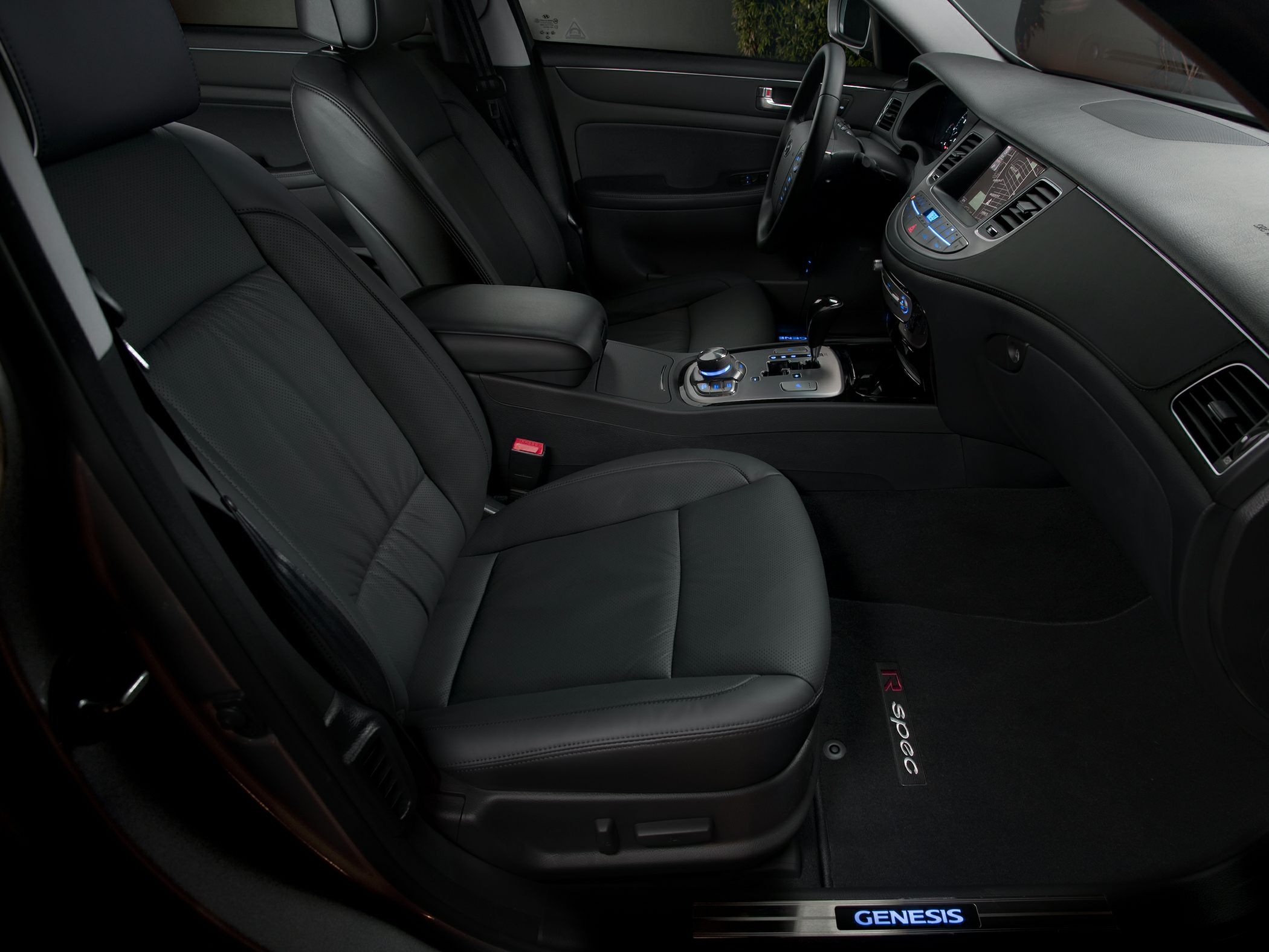 Luxury black leather seats with advanced console and illuminated door sill