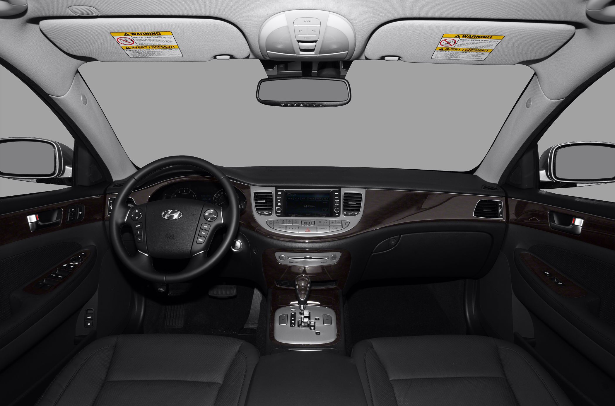 Dashboard, steering wheel, center console with wood trim