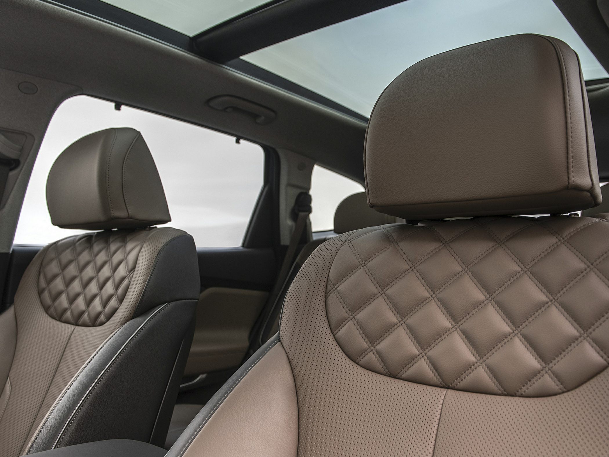Diamond quilted leather seats with panoramic sunroof