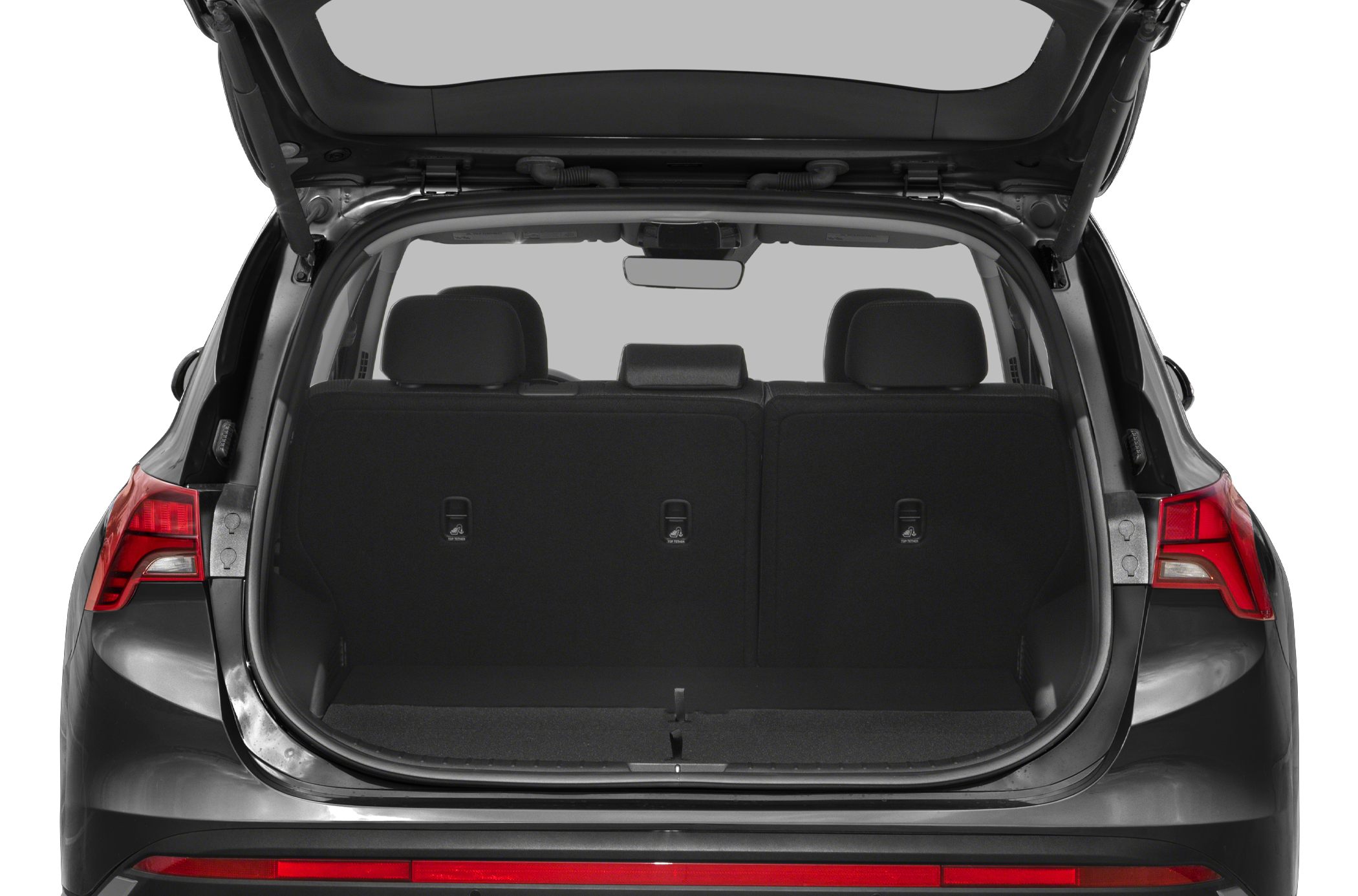 Open rear cargo area with upright seats and rear lights.