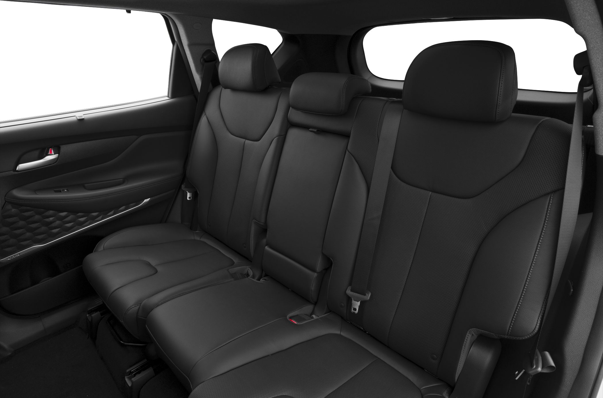 Black leather rear passenger seats with headrests and seatbelts