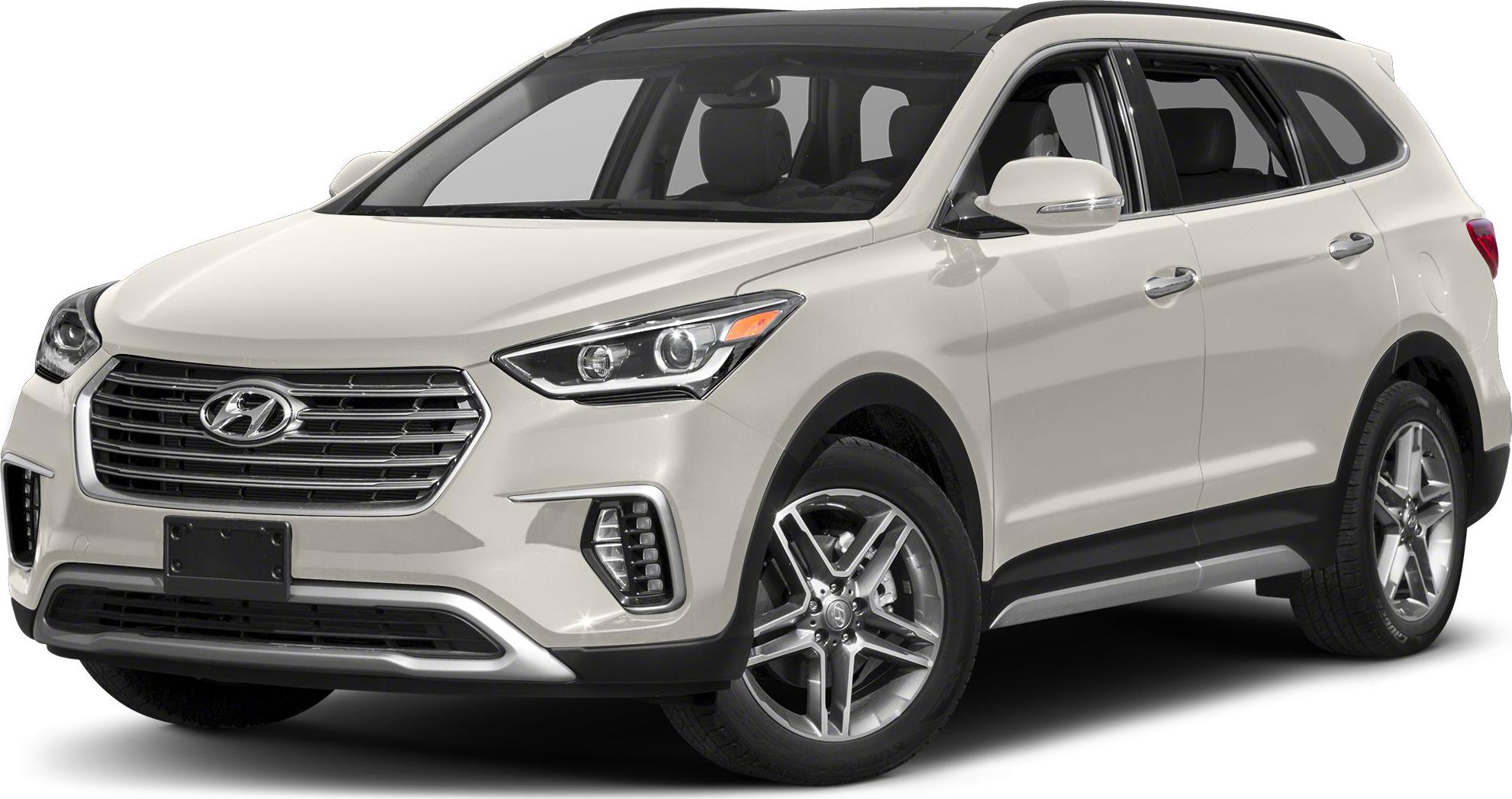 Front and side view of white SUV with prominent grille and alloy wheels