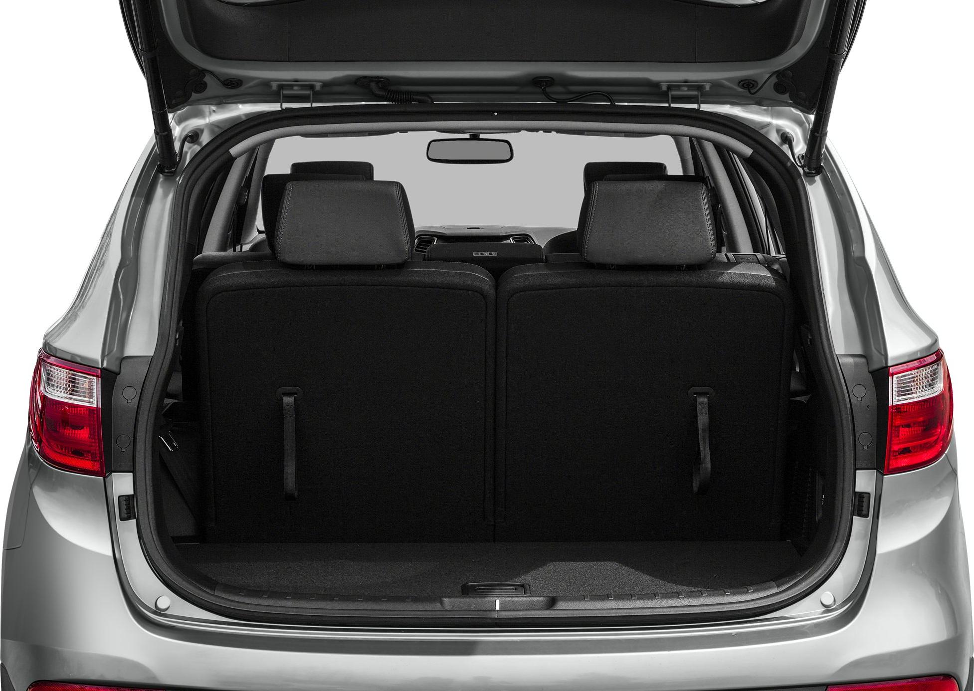 Rear cargo space with split foldable seats and open hatch