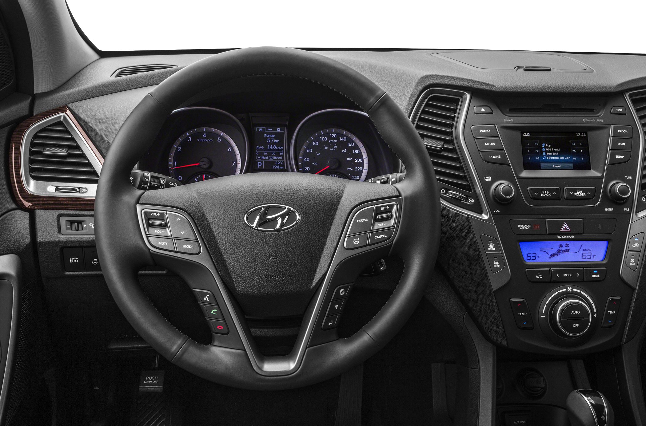 Steering wheel, dashboard, and center control panel with infotainment and climate controls