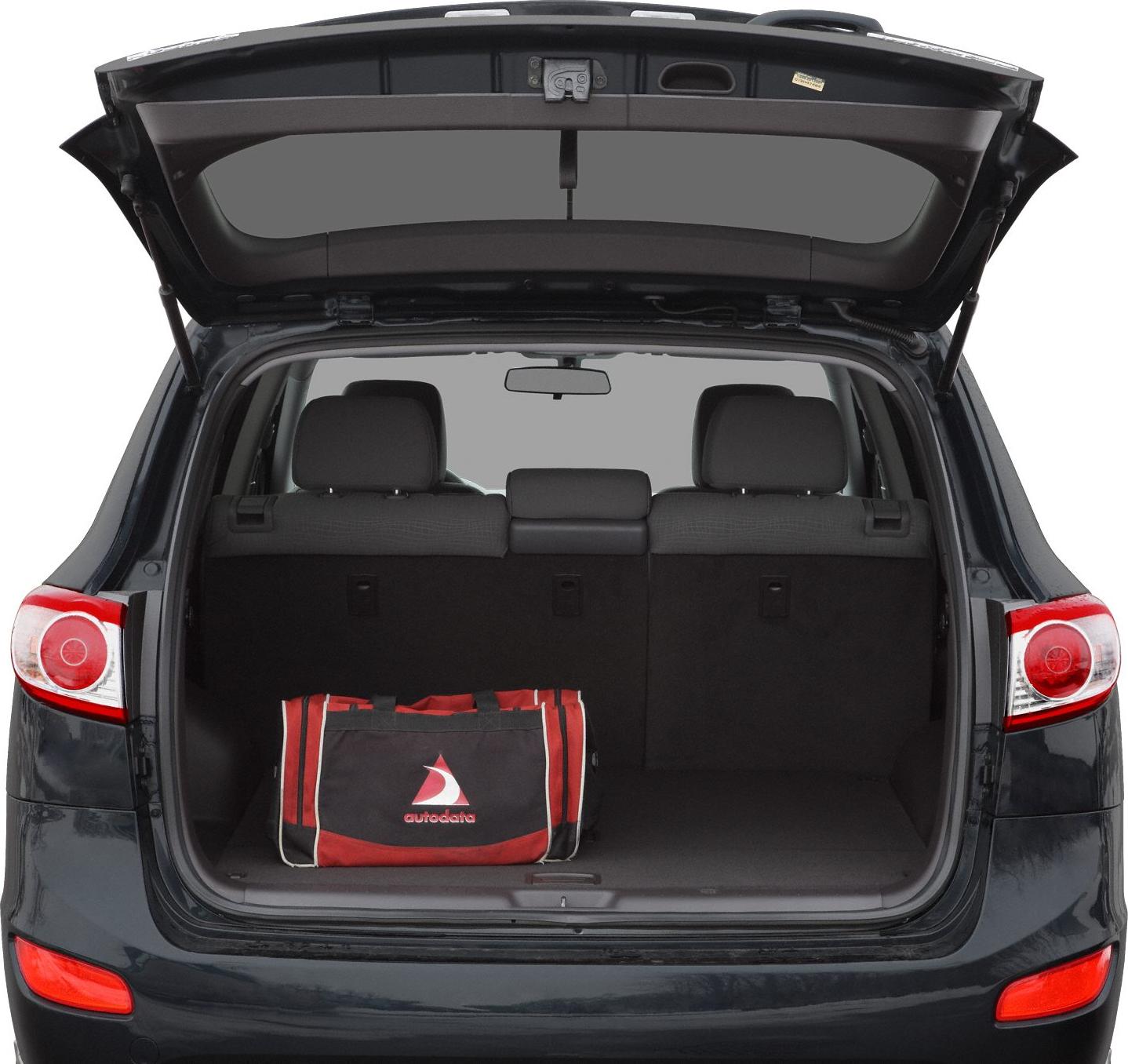 Open rear trunk space with red and black bag